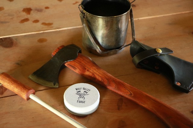 handmade, usa made, usa made axe, hatchet, chopping, wood chopping, outdoor, outdoorsman, survival, backwoodsman, hickory, axe made in america, axes made in the usa, ike bullington, isaac bullington, wolf valley forge, valley forge, pack axe, back packing, camping, trail axe, hunting axe, trappers axe, camp axe, bush axe, belt axe, pack axe, leather shoulder rig, chopping axe, leather axe carrier, shoulder sling for axe, carpenter's axe, Wolf Valley Forge, Wolf Valley Forge axe release, Axe Wax