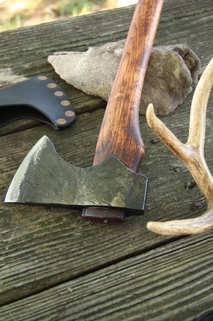 handmade, usa made, usa made axe, hatchet, chopping, wood chopping, outdoor, outdoorsman, survival, backwoodsman, hickory, axe made in america, axes made in the usa, ike bullington, isaac bullington, wolf valley forge, valley forge, pack axe, back packing, camping, trail axe, hunting axe, trappers axe, camp axe, bush axe, belt axe, pack axe, leather shoulder rig, chopping axe, leather axe carrier, shoulder sling for axe, carpenter's axe, Wolf Valley Forge, Wolf Valley Forge axe release, Axe Wax