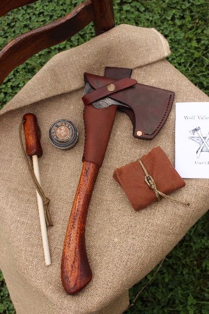 handmade, usa made, usa made axe, hatchet, chopping, wood chopping, outdoor, outdoorsman, survival, backwoodsman, hickory, axe made in america, axes made in the usa, ike bullington, wolf valley forge, valley forge, pack axe, back packing, camping, trail axe, hunting axe, trappers axe, camp axe, bush axe, belt axe, pack axe, leather shoulder rig, chopping axe, leather axe carrier, shoulder sling for axe, carpenter's axe, Wolf Valley Forge, Wolf Valley Forge axe release, Axe Wax, haversack, go back, man purse, man bag, canvas bag, reenactor, reenacting, Trekker Axe, Axe Life