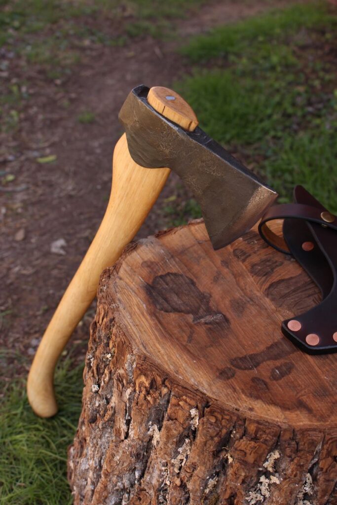 handmade, usa made, usa made axe, hatchet, chopping, wood chopping, outdoor, outdoorsman, survival, backwoodsman, hickory, axe made in america, axes made in the usa, ike bullington, wolf valley forge, valley forge, pack axe, back packing, camping, trail axe, hunting axe, trappers axe, camp axe, bush axe, belt axe, pack axe, leather shoulder rig, chopping axe, leather axe carrier, shoulder sling for axe, carpenter's axe, Wolf Valley Forge, Wolf Valley Forge axe release, Axe Wax, haversack, go bag, man purse, man bag, canvas bag, reenactor, reenacting, Trekker Axe, Axe Life, Splitting Wedge, Handforged Wedge