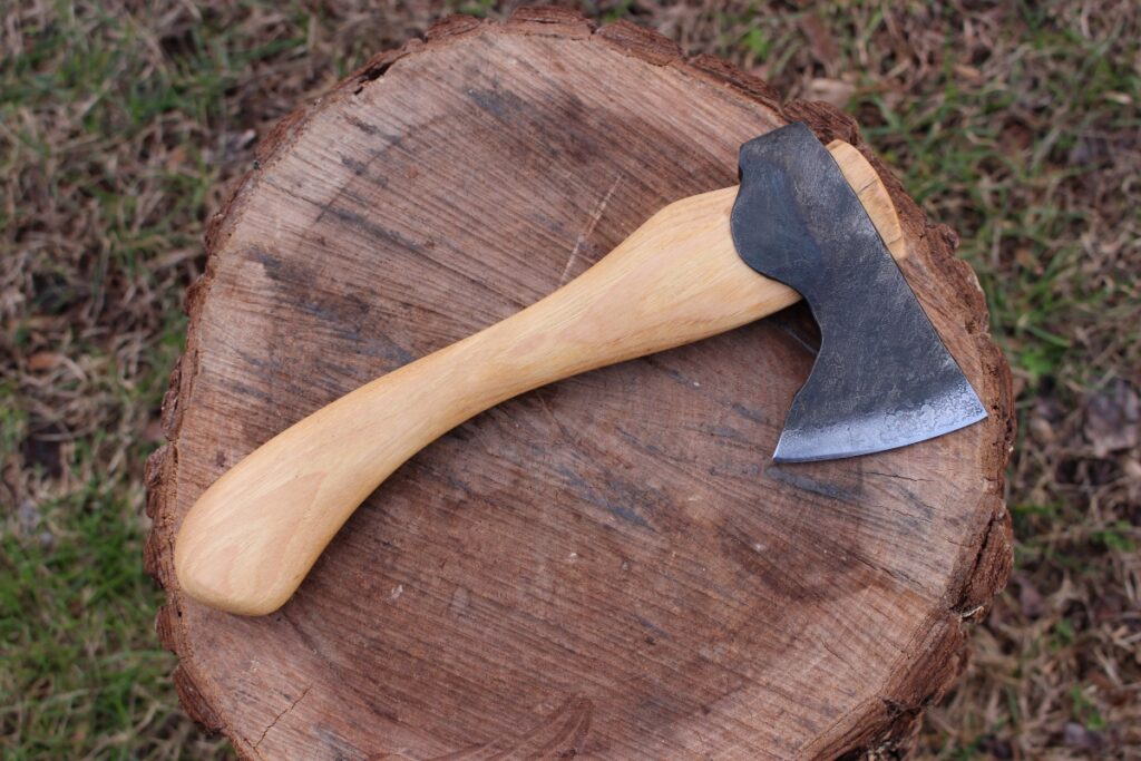 handmade, usa made, usa made axe, hatchet, chopping, wood chopping, outdoor, outdoorsman, survival, backwoodsman, hickory, axe made in america, axes made in the usa, ike bullington, wolf valley forge, valley forge, pack axe, back packing, camping, trail axe, hunting axe, trappers axe, camp axe, bush axe, belt axe, pack axe, leather shoulder rig, chopping axe, leather axe carrier, shoulder sling for axe, carpenter's axe, Wolf Valley Forge, Wolf Valley Forge axe release, Axe Wax, haversack, go bag, man purse, man bag, canvas bag, reenactor, reenacting, Trekker Axe, Axe Life, Splitting Wedge, Handforged Wedge