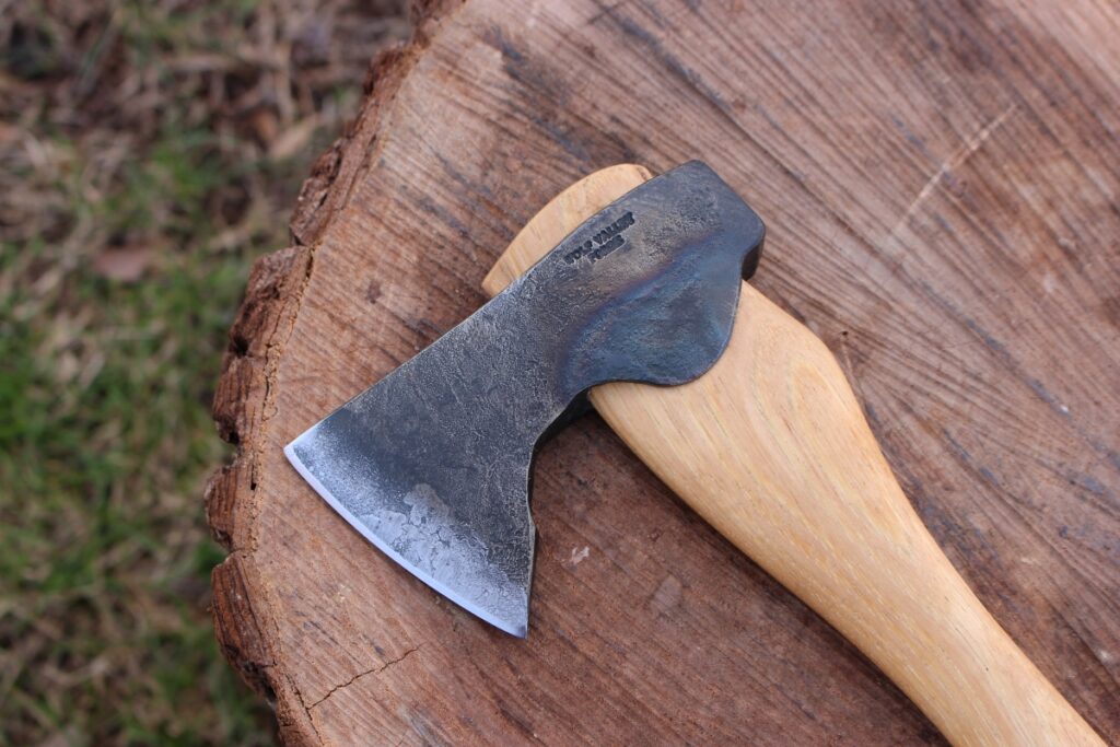 handmade, usa made, usa made axe, hatchet, chopping, wood chopping, outdoor, outdoorsman, survival, backwoodsman, hickory, axe made in america, axes made in the usa, ike bullington, wolf valley forge, valley forge, pack axe, back packing, camping, trail axe, hunting axe, trappers axe, camp axe, bush axe, belt axe, pack axe, leather shoulder rig, chopping axe, leather axe carrier, shoulder sling for axe, carpenter's axe, Wolf Valley Forge, Wolf Valley Forge axe release, Axe Wax, haversack, go bag, man purse, man bag, canvas bag, reenactor, reenacting, Trekker Axe, Axe Life, Splitting Wedge, Handforged Wedge