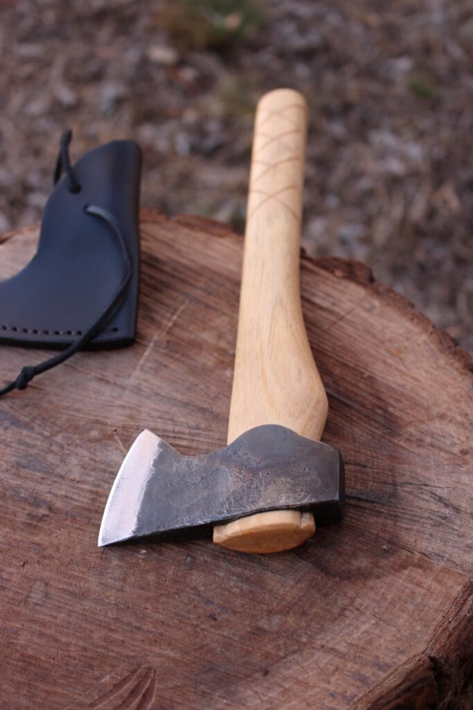 handmade, usa made, usa made axe, hatchet, chopping, wood chopping, outdoor, outdoorsman, survival, backwoodsman, hickory, axe made in america, axes made in the usa, ike bullington, wolf valley forge, valley forge, pack axe, back packing, camping, trail axe, hunting axe, trappers axe, camp axe, bush axe, belt axe, pack axe, leather shoulder rig, chopping axe, leather axe carrier, shoulder sling for axe, carpenter's axe, Wolf Valley Forge, Wolf Valley Forge axe release, Axe Wax, haversack, go bag, man purse, man bag, canvas bag, reenactor, reenacting, Trekker Axe, Axe Life, Splitting Wedge, Handforged Wedge