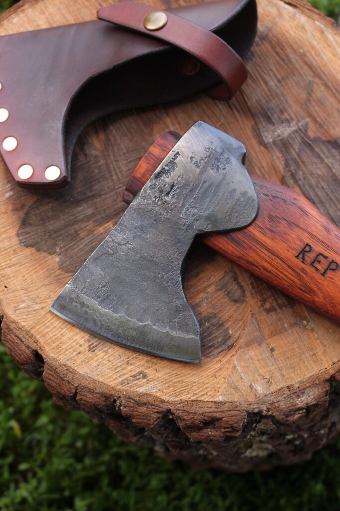 handmade, usa made, usa made axe, hatchet, chopping, wood chopping, outdoor, outdoorsman, survival, backwoodsman, hickory, axe made in america, axes made in the usa, ike bullington, wolf valley forge, valley forge, pack axe, back packing, camping, trail axe, hunting axe, trappers axe, camp axe, bush axe, belt axe, pack axe, leather shoulder rig, chopping axe, leather axe carrier, shoulder sling for axe, carpenter's axe, Wolf Valley Forge, Wolf Valley Forge axe release, Axe Wax, haversack, go bag, man purse, man bag, canvas bag, reenactor, reenacting, Trekker Axe, Axe Life