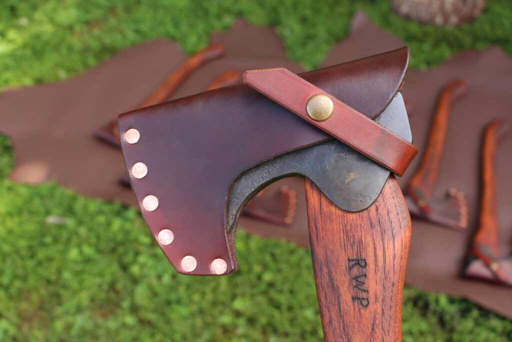 handmade, usa made, usa made axe, hatchet, chopping, wood chopping, outdoor, outdoorsman, survival, backwoodsman, hickory, axe made in america, axes made in the usa, ike bullington, wolf valley forge, valley forge, pack axe, back packing, camping, trail axe, hunting axe, trappers axe, camp axe, bush axe, belt axe, pack axe, leather shoulder rig, chopping axe, leather axe carrier, shoulder sling for axe, carpenter's axe, Wolf Valley Forge, Wolf Valley Forge axe release, Axe Wax, haversack, go bag, man purse, man bag, canvas bag, reenactor, reenacting, Trekker Axe, Axe Life