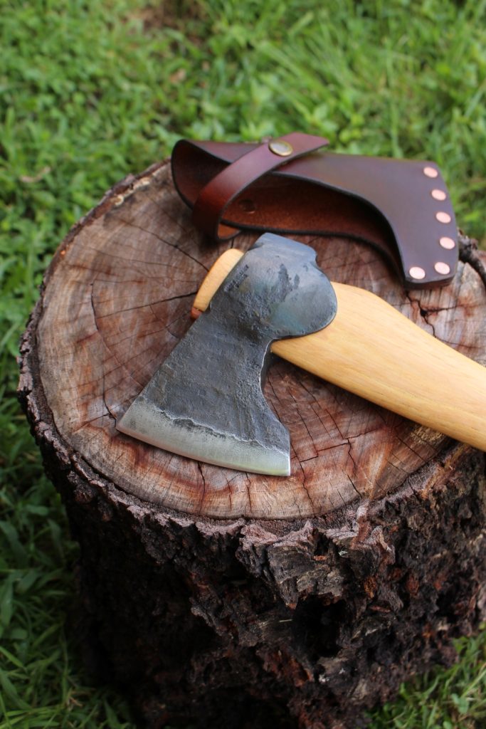 handmade, usa made, usa made axe, hatchet, chopping, wood chopping, outdoor, outdoorsman, survival, backwoodsman, hickory, axe made in america, axes made in the usa, ike bullington, wolf valley forge, valley forge, pack axe, back packing, camping, trail axe, hunting axe, trappers axe, camp axe, bush axe, belt axe, pack axe, leather shoulder rig, chopping axe, leather axe carrier, shoulder sling for axe, carpenter's axe, Wolf Valley Forge, Wolf Valley Forge axe release, Axe Wax, haversack, go bag, man purse, man bag, canvas bag, reenactor, reenacting, Trekker Axe, Axe Life, Splitting Wedge, Handforged Wedge