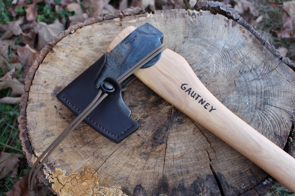 handmade, usa made, usa made axe, hatchet, chopping, wood chopping, outdoor, outdoorsman, survival, backwoodsman, hickory, axe made in america, axes made in the usa, ike bullington, wolf valley forge, valley forge, pack axe, back packing, camping, trail axe, hunting axe, trappers axe, camp axe, bush axe, belt axe, pack axe, leather shoulder rig, chopping axe, leather axe carrier, shoulder sling for axe, carpenter's axe, Wolf Valley Forge, Wolf Valley Forge axe release, Axe Wax, haversack, go back, man purse, man bag, canvas bag, reenactor, reenacting, The Trekker