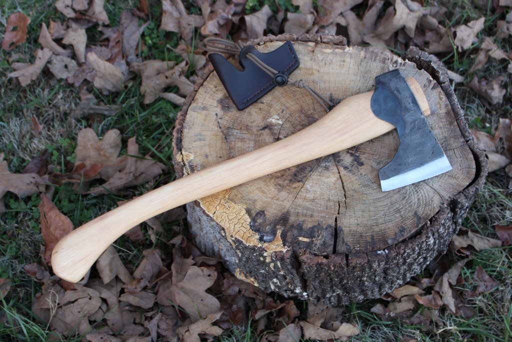 handmade, usa made, usa made axe, hatchet, chopping, wood chopping, outdoor, outdoorsman, survival, backwoodsman, hickory, axe made in america, axes made in the usa, ike bullington, wolf valley forge, valley forge, pack axe, back packing, camping, trail axe, hunting axe, trappers axe, camp axe, bush axe, belt axe, pack axe, leather shoulder rig, chopping axe, leather axe carrier, shoulder sling for axe, carpenter's axe, Wolf Valley Forge, Wolf Valley Forge axe release, Axe Wax, haversack, go back, man purse, man bag, canvas bag, reenactor, reenacting, The Trekker