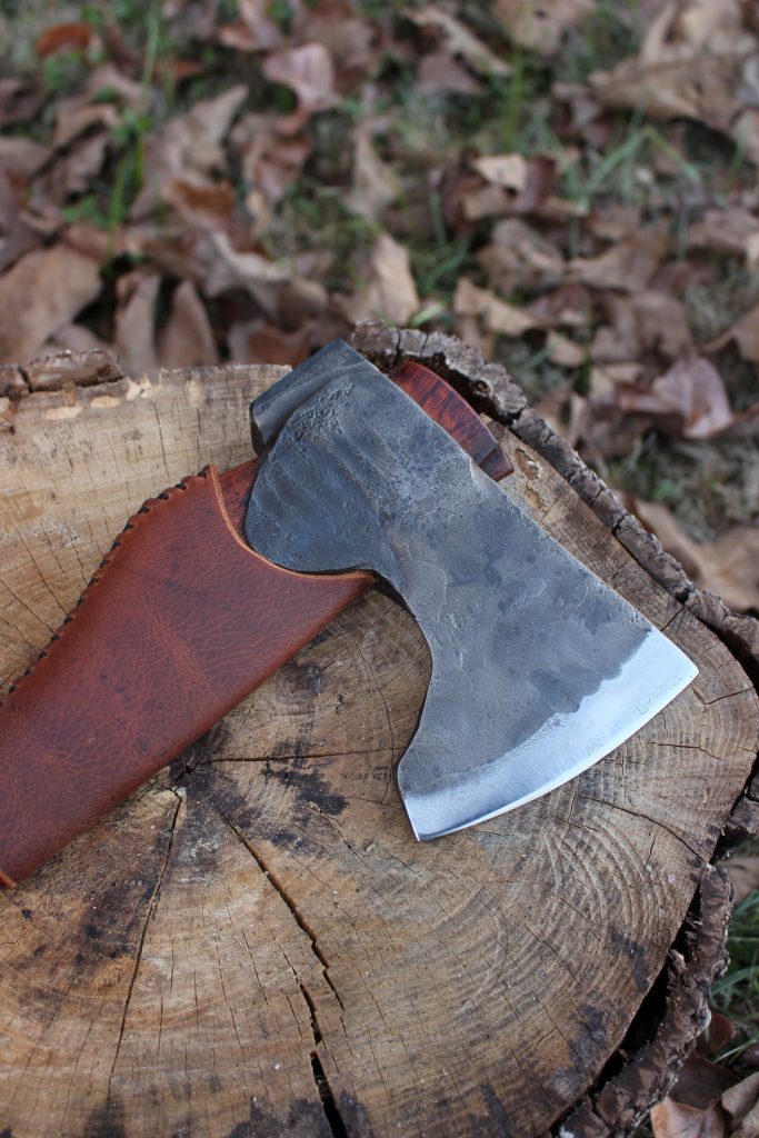 handmade, usa made, usa made axe, hatchet, chopping, wood chopping, outdoor, outdoorsman, survival, backwoodsman, hickory, axe made in america, axes made in the usa, ike bullington, wolf valley forge, valley forge, pack axe, back packing, camping, trail axe, hunting axe, trappers axe, camp axe, bush axe, belt axe, pack axe, leather shoulder rig, chopping axe, leather axe carrier, shoulder sling for axe, carpenter's axe, Wolf Valley Forge, Wolf Valley Forge axe release, Axe Wax, haversack, go back, man purse, man bag, canvas bag, reenactor, reenacting, The Trekker