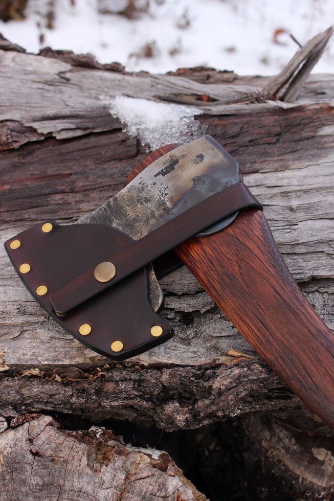 handmade, usa made, usa made axe, hatchet, chopping, wood chopping, outdoor, outdoorsman, survival, backwoodsman, hickory, axe made in america, axes made in the usa, ike bullington, wolf valley forge, valley forge, pack axe, back packing, camping, trail axe, hunting axe, trappers axe, camp axe, bush axe, belt axe, pack axe, leather shoulder rig, chopping axe, leather axe carrier, shoulder sling for axe, carpenter's axe, Wolf Valley Forge, Wolf Valley Forge axe release, Axe Wax, haversack, go bag, man purse, man bag, canvas bag, reenactor, reenacting, Trekker Axe, Axe Life, Splitting Wedge, Handforged Wedge