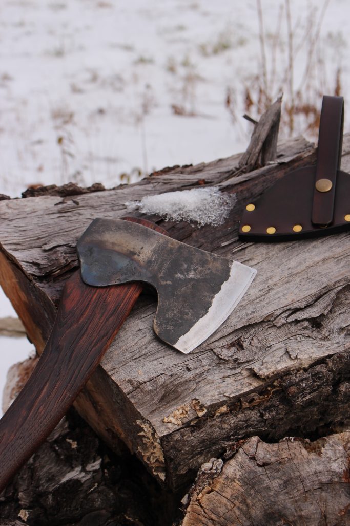 handmade, usa made, usa made axe, hatchet, chopping, wood chopping, outdoor, outdoorsman, survival, backwoodsman, hickory, axe made in america, axes made in the usa, ike bullington, wolf valley forge, valley forge, pack axe, back packing, camping, trail axe, hunting axe, trappers axe, camp axe, bush axe, belt axe, pack axe, leather shoulder rig, chopping axe, leather axe carrier, shoulder sling for axe, carpenter's axe, Wolf Valley Forge, Wolf Valley Forge axe release, Axe Wax, haversack, go bag, man purse, man bag, canvas bag, reenactor, reenacting, Trekker Axe, Axe Life, Splitting Wedge, Handforged Wedge