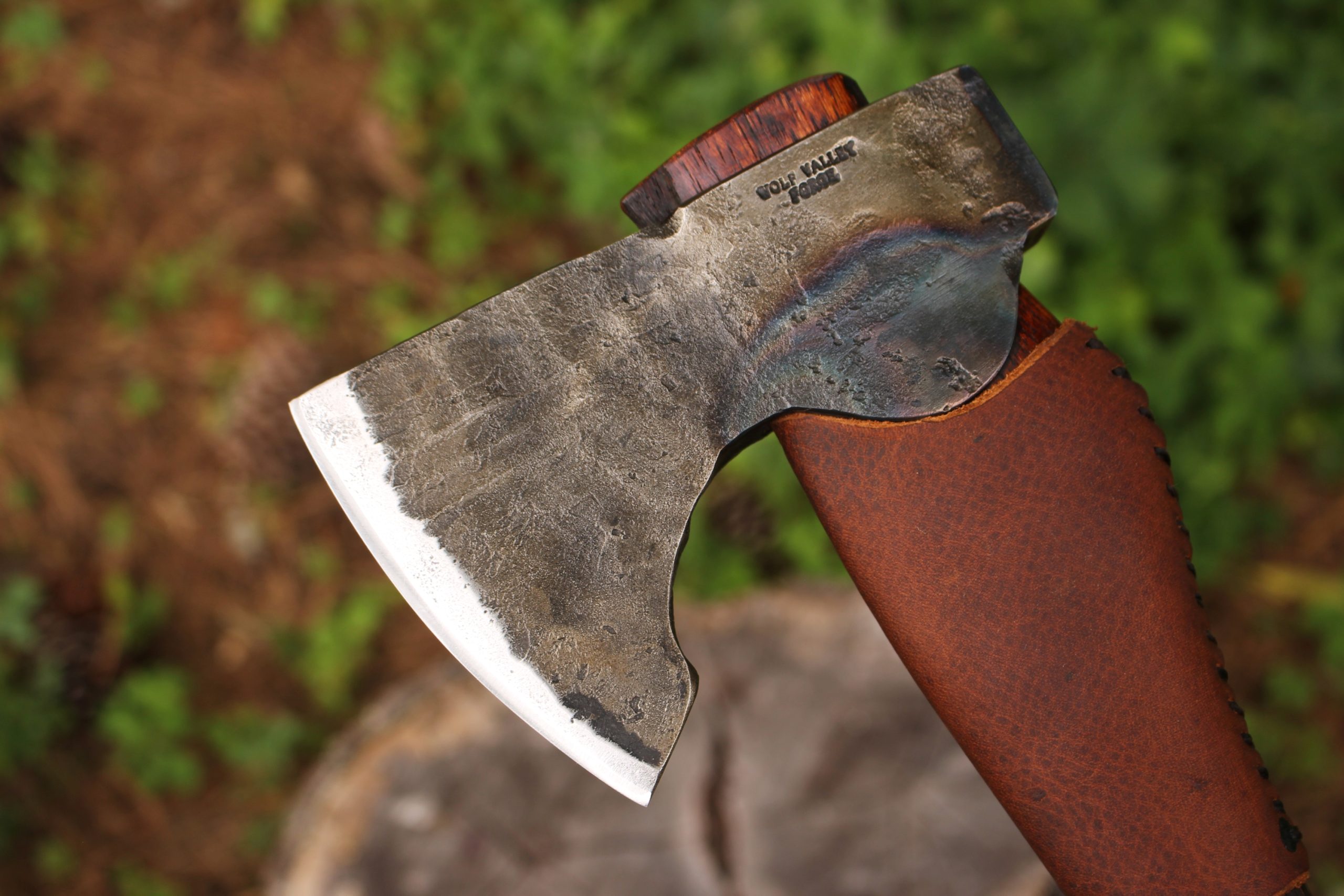 handmade, usa made, usa made axe, hatchet, chopping, wood chopping, outdoor, outdoorsman, survival, backwoodsman, hickory, axe made in america, axes made in the usa, ike bullington, wolf valley forge, valley forge, pack axe, back packing, camping, trail axe, hunting axe, trappers axe, camp axe, bush axe, belt axe, pack axe, leather shoulder rig, chopping axe, leather axe carrier, shoulder sling for axe, carpenter's axe, Wolf Valley Forge, Wolf Valley Forge axe release, Axe Wax, haversack, go back, man purse, man bag, canvas bag, reenactor, reenacting, The Trekker