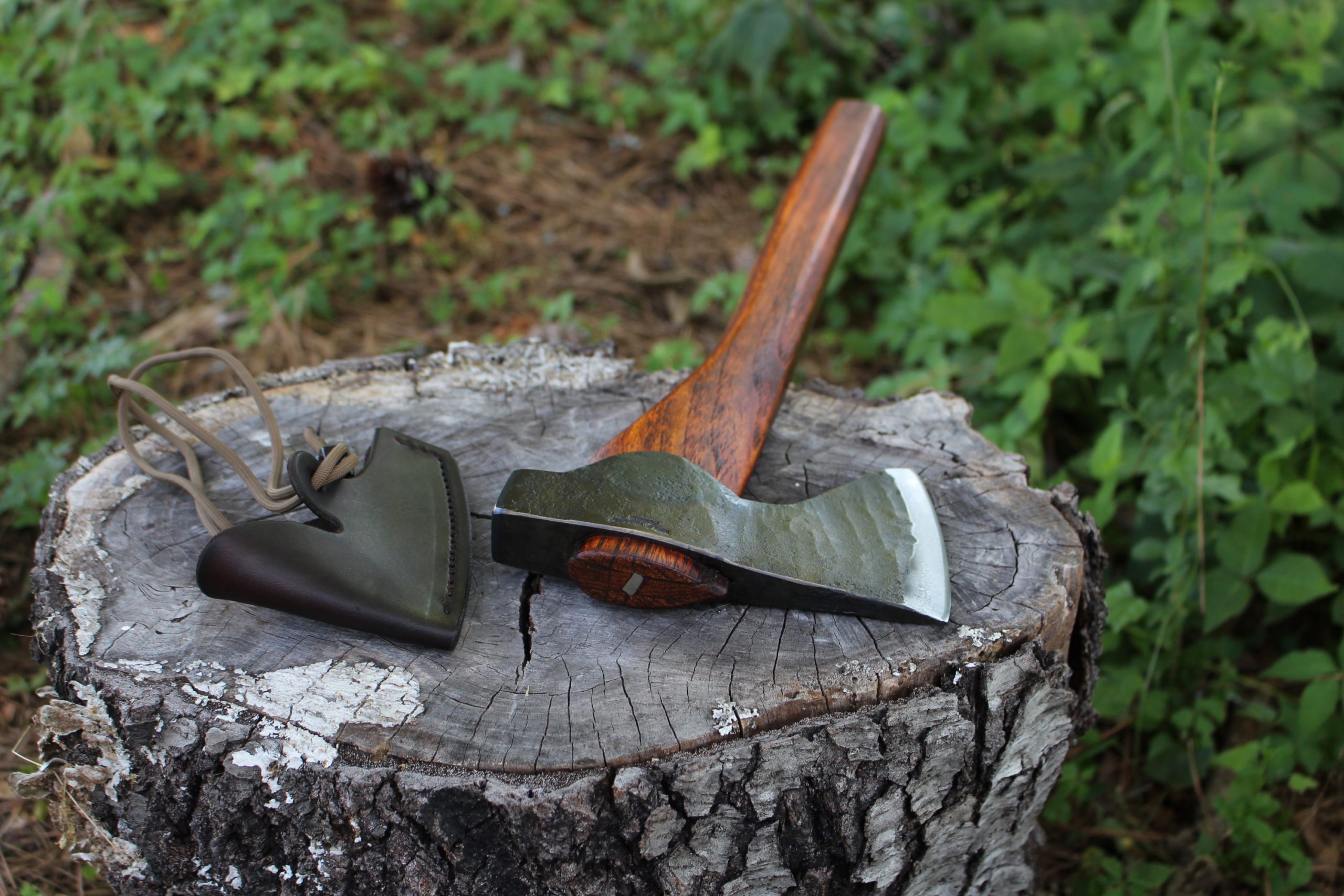 handmade, usa made, usa made axe, hatchet, chopping, wood chopping, outdoor, outdoorsman, survival, backwoodsman, hickory, axe made in america, axes made in the usa, ike bullington, wolf valley forge, valley forge, pack axe, back packing, camping, trail axe, hunting axe, trappers axe, camp axe, bush axe, belt axe, pack axe, leather shoulder rig, chopping axe, leather axe carrier, shoulder sling for axe, carpenter's axe, Wolf Valley Forge, Wolf Valley Forge axe release, Axe Wax, haversack, go back, man purse, man bag, canvas bag, reenactor, reenacting, The Trekker