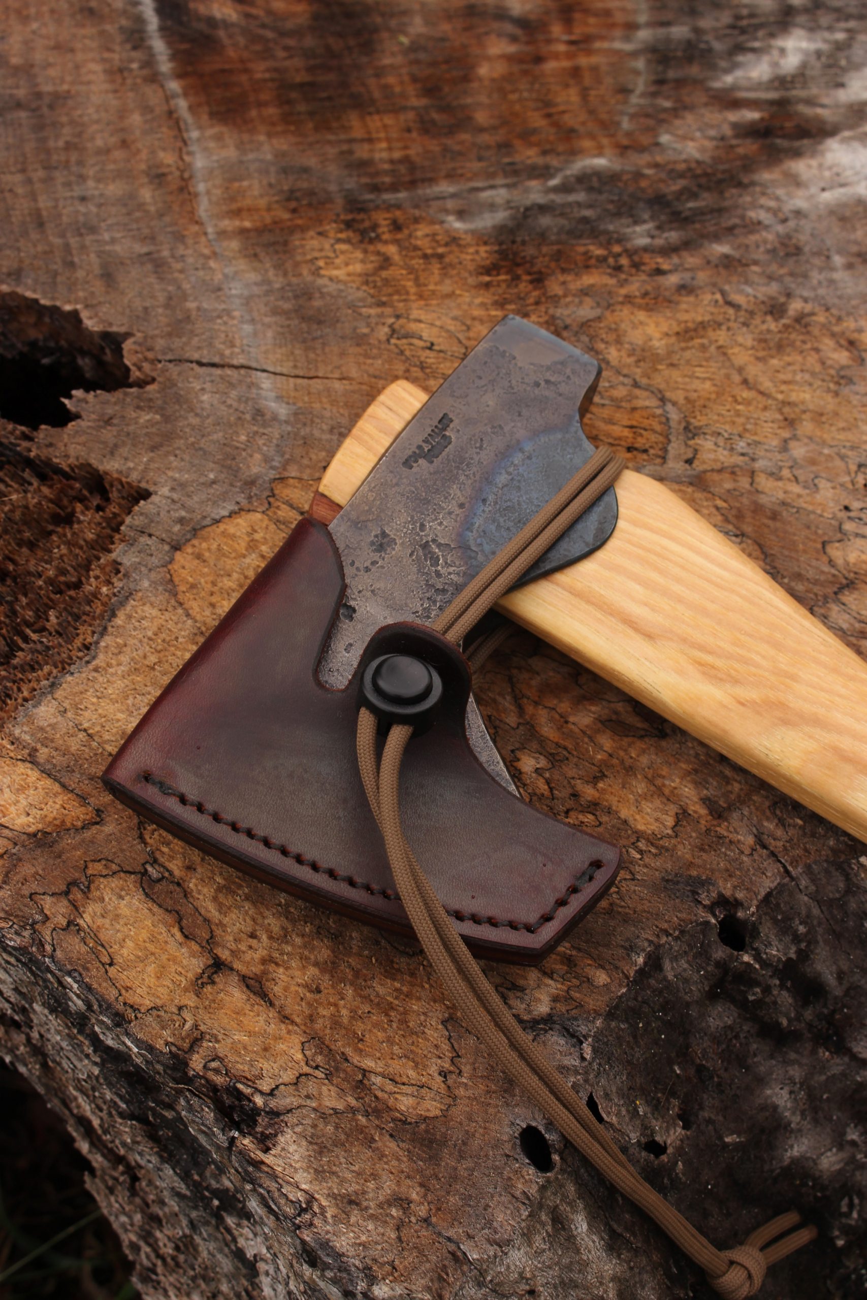 handmade, usa made, usa made axe, hatchet, chopping, wood chopping, outdoor, outdoorsman, survival, backwoodsman, hickory, axe made in america, axes made in the usa, ike bullington, wolf valley forge, valley forge, pack axe, back packing, camping, trail axe, hunting axe, trappers axe, camp axe, bush axe, belt axe, pack axe, leather shoulder rig, chopping axe, leather axe carrier, shoulder sling for axe, carpenter's axe, Wolf Valley Forge, Wolf Valley Forge axe release, Axe Wax, haversack, go back, man purse, man bag, canvas bag, reenactor, reenacting, The Trekker