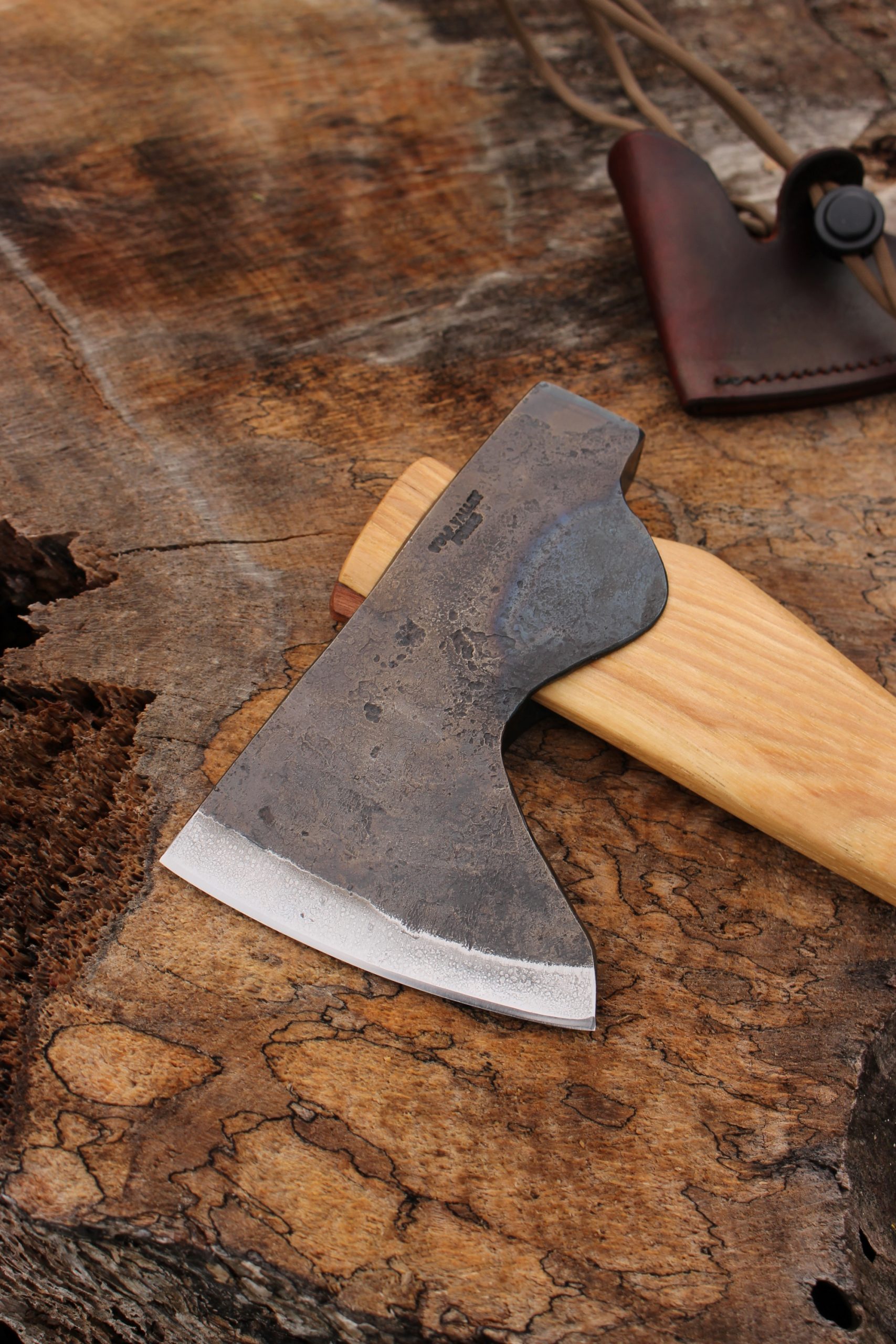 handmade, usa made, usa made axe, hatchet, chopping, wood chopping, outdoor, outdoorsman, survival, backwoodsman, hickory, axe made in america, axes made in the usa, ike bullington, wolf valley forge, valley forge, pack axe, back packing, camping, trail axe, hunting axe, trappers axe, camp axe, bush axe, belt axe, pack axe, leather shoulder rig, chopping axe, leather axe carrier, shoulder sling for axe, carpenter's axe, Wolf Valley Forge, Wolf Valley Forge axe release, Axe Wax, haversack, go back, man purse, man bag, canvas bag, reenactor, reenacting, The Trekker