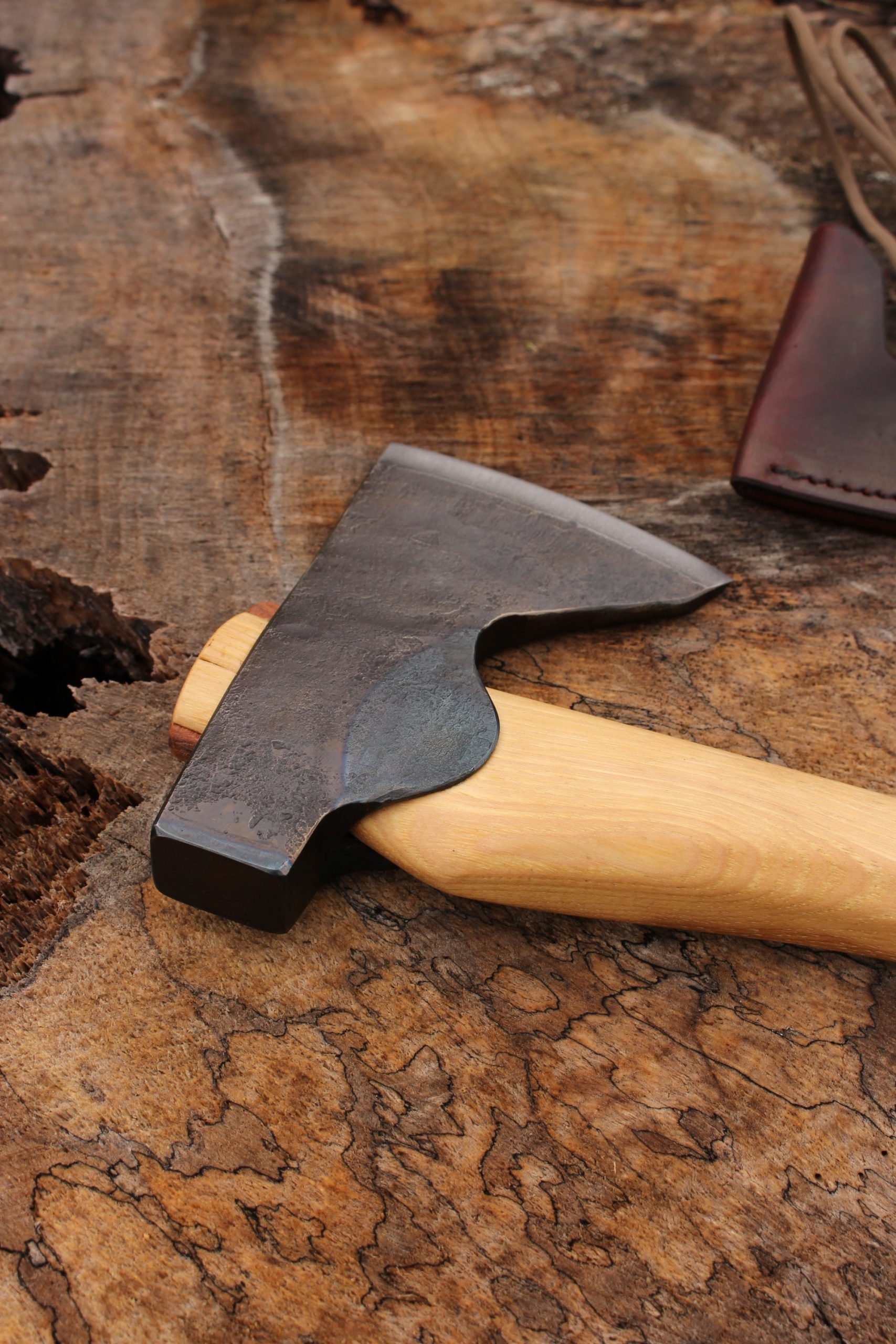 handmade, usa made, usa made axe, hatchet, chopping, wood chopping, outdoor, outdoorsman, survival, backwoodsman, hickory, axe made in america, axes made in the usa, ike bullington, wolf valley forge, valley forge, pack axe, back packing, camping, trail axe, hunting axe, trappers axe, camp axe, bush axe, belt axe, pack axe, leather shoulder rig, chopping axe, leather axe carrier, shoulder sling for axe, carpenter's axe, Wolf Valley Forge, Wolf Valley Forge axe release, Axe Wax, haversack, go back, man purse, man bag, canvas bag, reenactor, reenacting, The Trekker