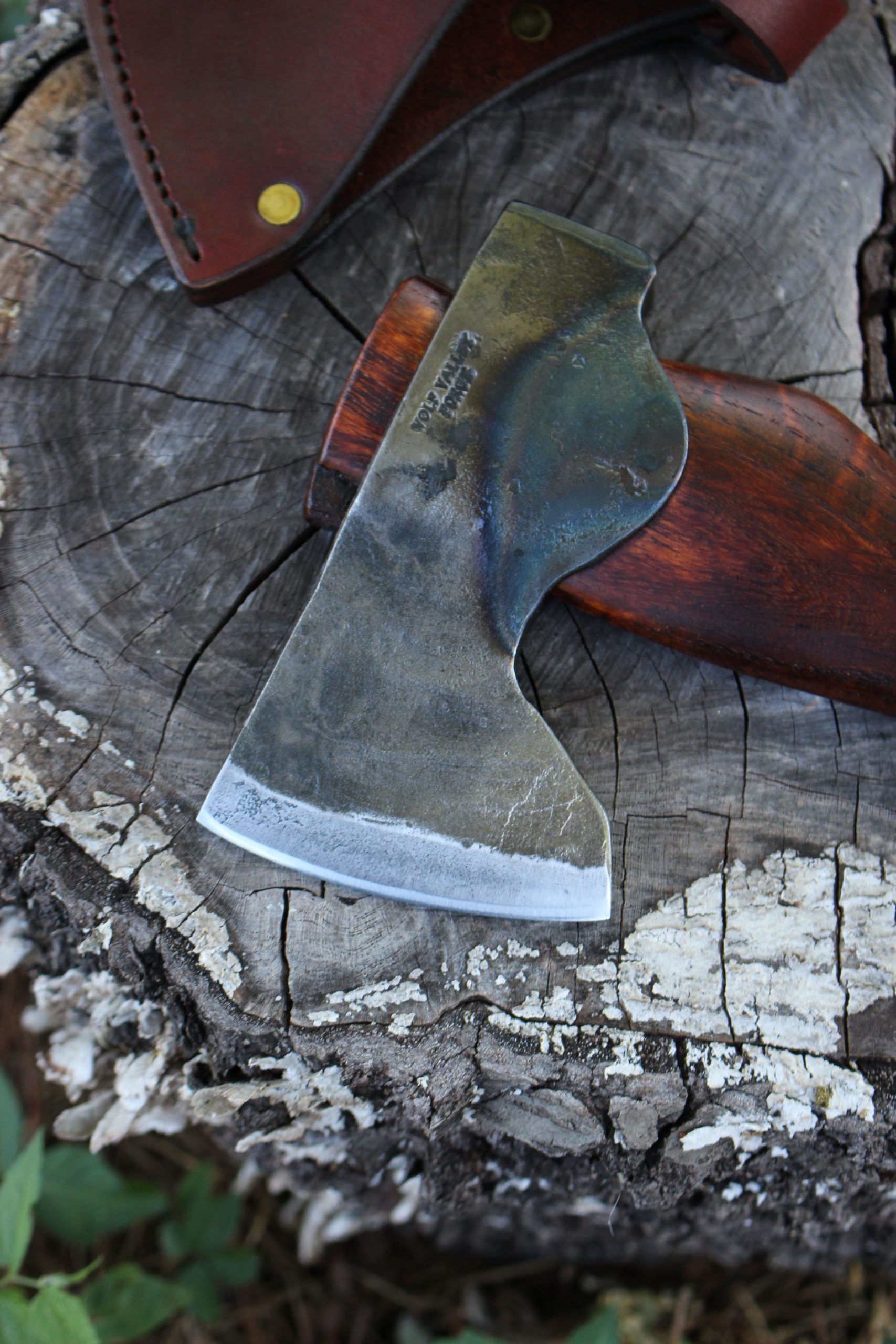 handmade, usa made, usa made axe, hatchet, chopping, wood chopping, outdoor, outdoorsman, survival, backwoodsman, hickory, axe made in america, axes made in the usa, ike bullington, wolf valley forge, valley forge, pack axe, back packing, camping, trail axe, hunting axe, trappers axe, camp axe, bush axe, belt axe, pack axe, leather shoulder rig, chopping axe, leather axe carrier, shoulder sling for axe, carpenter's axe, Wolf Valley Forge, Wolf Valley Forge axe release, Axe Wax, haversack, go back, man purse, man bag, canvas bag, reenactor, reenacting, The Trekker