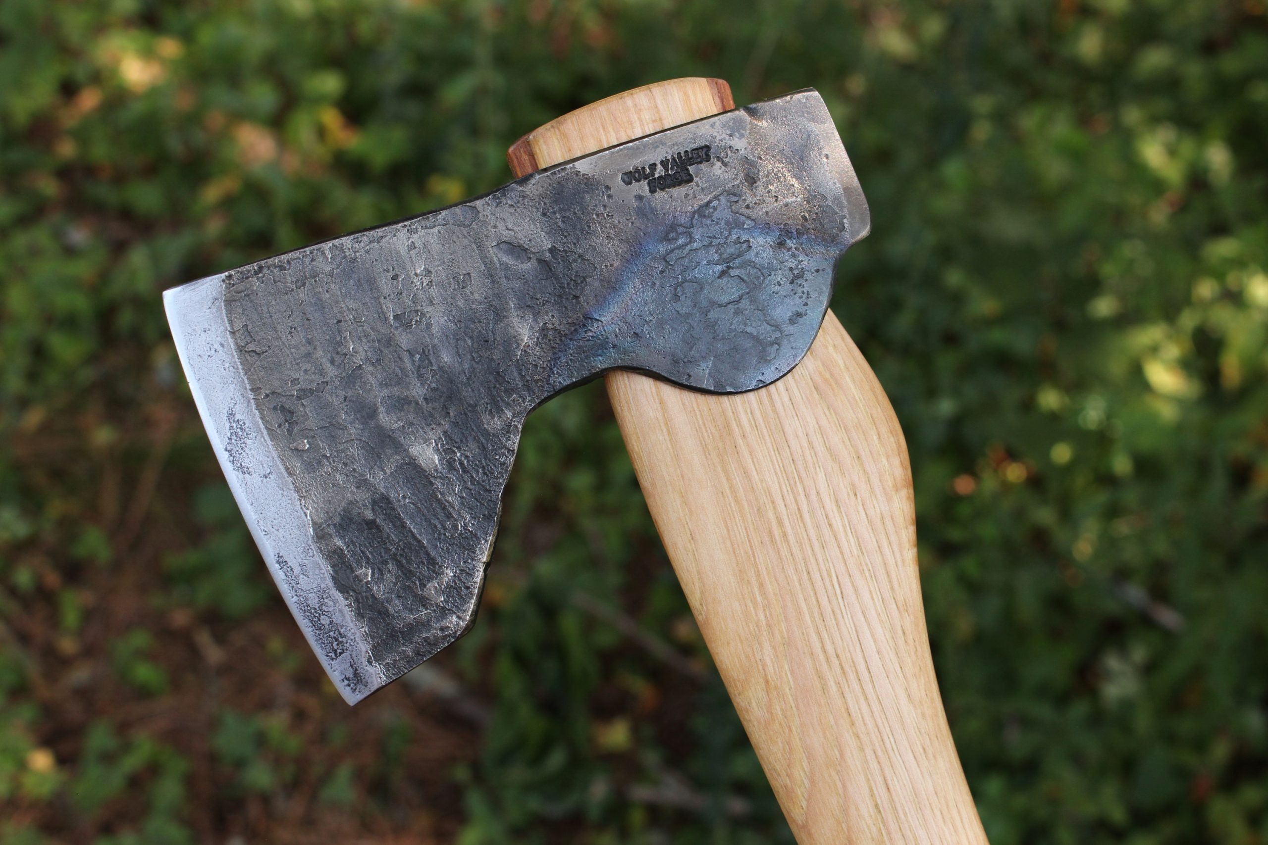 handmade, usa made, usa made axe, hatchet, chopping, wood chopping, outdoor, outdoorsman, survival, backwoodsman, hickory, axe made in america, axes made in the usa, ike bullington, wolf valley forge, valley forge, pack axe, back packing, camping, trail axe, hunting axe, trappers axe, camp axe, bush axe, belt axe, pack axe, leather shoulder rig, chopping axe, leather axe carrier, shoulder sling for axe, carpenter's axe, Wolf Valley Forge, Wolf Valley Forge axe release, Axe Wax, haversack, go back, man purse, man bag, canvas bag, reenactor, reenacting, The Trekker