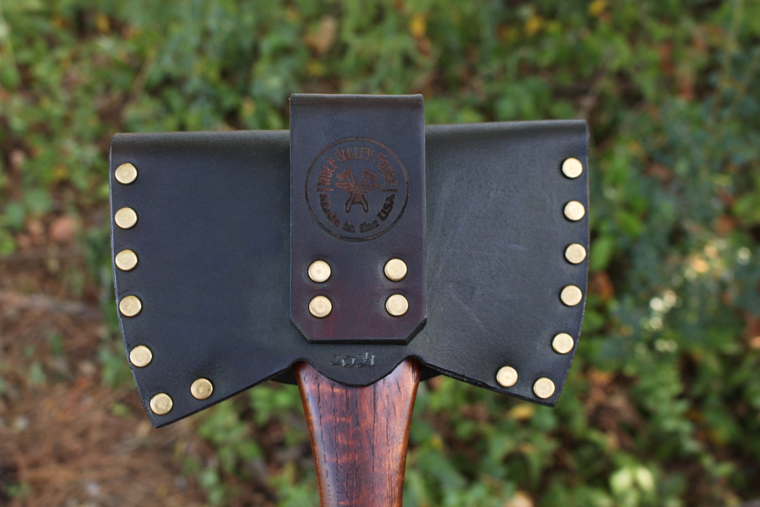 handmade, usa made, usa made axe, hatchet, chopping, wood chopping, outdoor, outdoorsman, survival, backwoodsman, hickory, axe made in america, axes made in the usa, ike bullington, wolf valley forge, valley forge, pack axe, back packing, camping, trail axe, hunting axe, trappers axe, camp axe, bush axe, belt axe, pack axe, leather shoulder rig, chopping axe, leather axe carrier, shoulder sling for axe, carpenter's axe, Wolf Valley Forge, Wolf Valley Forge axe release, Axe Wax, haversack, go back, man purse, man bag, canvas bag, reenactor, reenacting, The Trekker