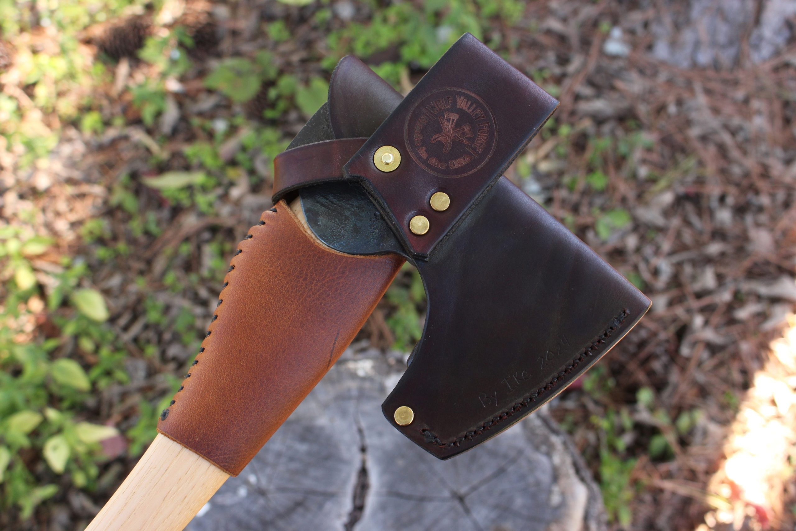 handmade, usa made, usa made axe, hatchet, chopping, wood chopping, outdoor, outdoorsman, survival, backwoodsman, hickory, axe made in america, axes made in the usa, ike bullington, wolf valley forge, valley forge, pack axe, back packing, camping, trail axe, hunting axe, trappers axe, camp axe, bush axe, belt axe, pack axe, leather shoulder rig, chopping axe, leather axe carrier, shoulder sling for axe, carpenter's axe, Wolf Valley Forge, Wolf Valley Forge axe release, Axe Wax, haversack, go back, man purse, man bag, canvas bag, reenactor, reenacting, Trekker Axe, Axe Life