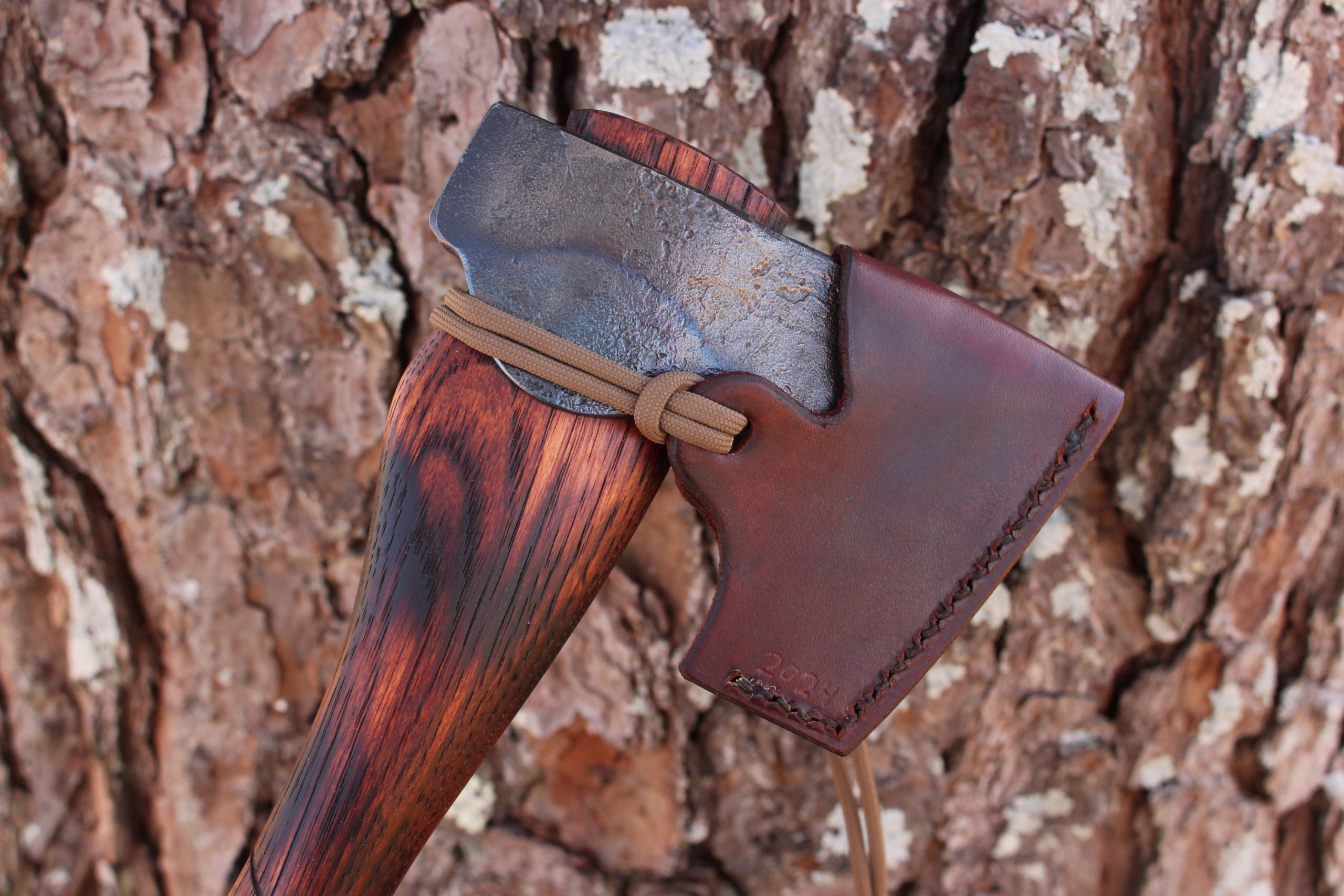 handmade, usa made, usa made axe, hatchet, chopping, wood chopping, outdoor, outdoorsman, survival, backwoodsman, hickory, axe made in america, axes made in the usa, ike bullington, wolf valley forge, valley forge, pack axe, back packing, camping, trail axe, hunting axe, trappers axe, camp axe, bush axe, belt axe, pack axe, leather shoulder rig, chopping axe, leather axe carrier, shoulder sling for axe, carpenter's axe, Wolf Valley Forge, Wolf Valley Forge axe release, Axe Wax, haversack, go back, man purse, man bag, canvas bag, reenactor, reenacting, Trekker Axe, Axe Life