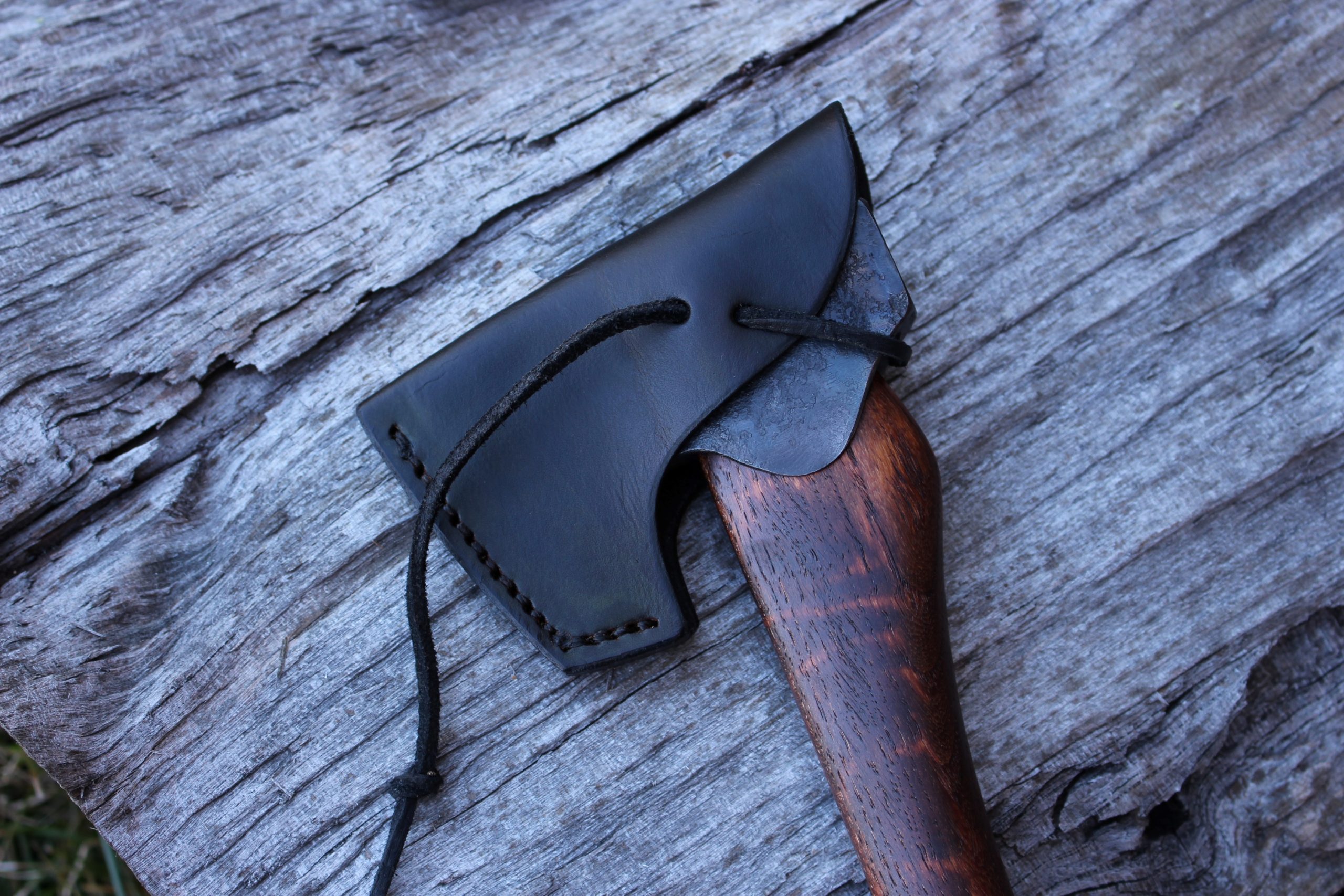 handmade, usa made, usa made axe, hatchet, chopping, wood chopping, outdoor, outdoorsman, survival, backwoodsman, hickory, axe made in america, axes made in the usa, ike bullington, wolf valley forge, valley forge, pack axe, back packing, camping, trail axe, hunting axe, trappers axe, camp axe, bush axe, belt axe, pack axe, leather shoulder rig, chopping axe, leather axe carrier, shoulder sling for axe, carpenter's axe, Wolf Valley Forge, Wolf Valley Forge axe release, Axe Wax, haversack, go back, man purse, man bag, canvas bag, reenactor, reenacting, Trekker Axe, Axe Life