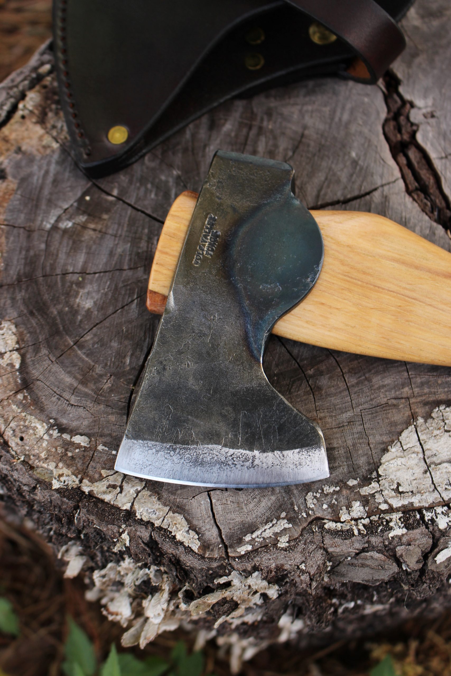 handmade, usa made, usa made axe, hatchet, chopping, wood chopping, outdoor, outdoorsman, survival, backwoodsman, hickory, axe made in america, axes made in the usa, ike bullington, wolf valley forge, valley forge, pack axe, back packing, camping, trail axe, hunting axe, trappers axe, camp axe, bush axe, belt axe, pack axe, leather shoulder rig, chopping axe, leather axe carrier, shoulder sling for axe, carpenter's axe, Wolf Valley Forge, Wolf Valley Forge axe release, Axe Wax, haversack, go back, man purse, man bag, canvas bag, reenactor, reenacting, Trekker Axe, Axe Life