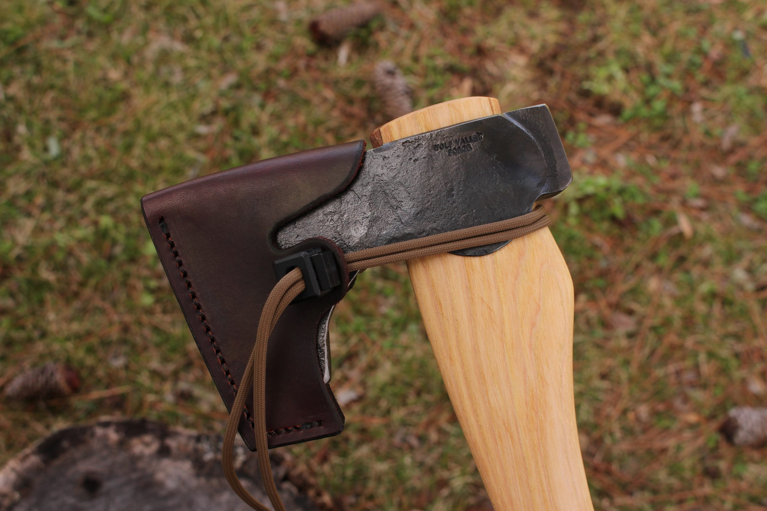 handmade, usa made, usa made axe, hatchet, chopping, wood chopping, outdoor, outdoorsman, survival, backwoodsman, hickory, axe made in america, axes made in the usa, ike bullington, wolf valley forge, valley forge, pack axe, back packing, camping, trail axe, hunting axe, trappers axe, camp axe, bush axe, belt axe, pack axe, leather shoulder rig, chopping axe, leather axe carrier, shoulder sling for axe, carpenter's axe, Wolf Valley Forge, Wolf Valley Forge axe release, Axe Wax, haversack, go back, man purse, man bag, canvas bag, reenactor, reenacting