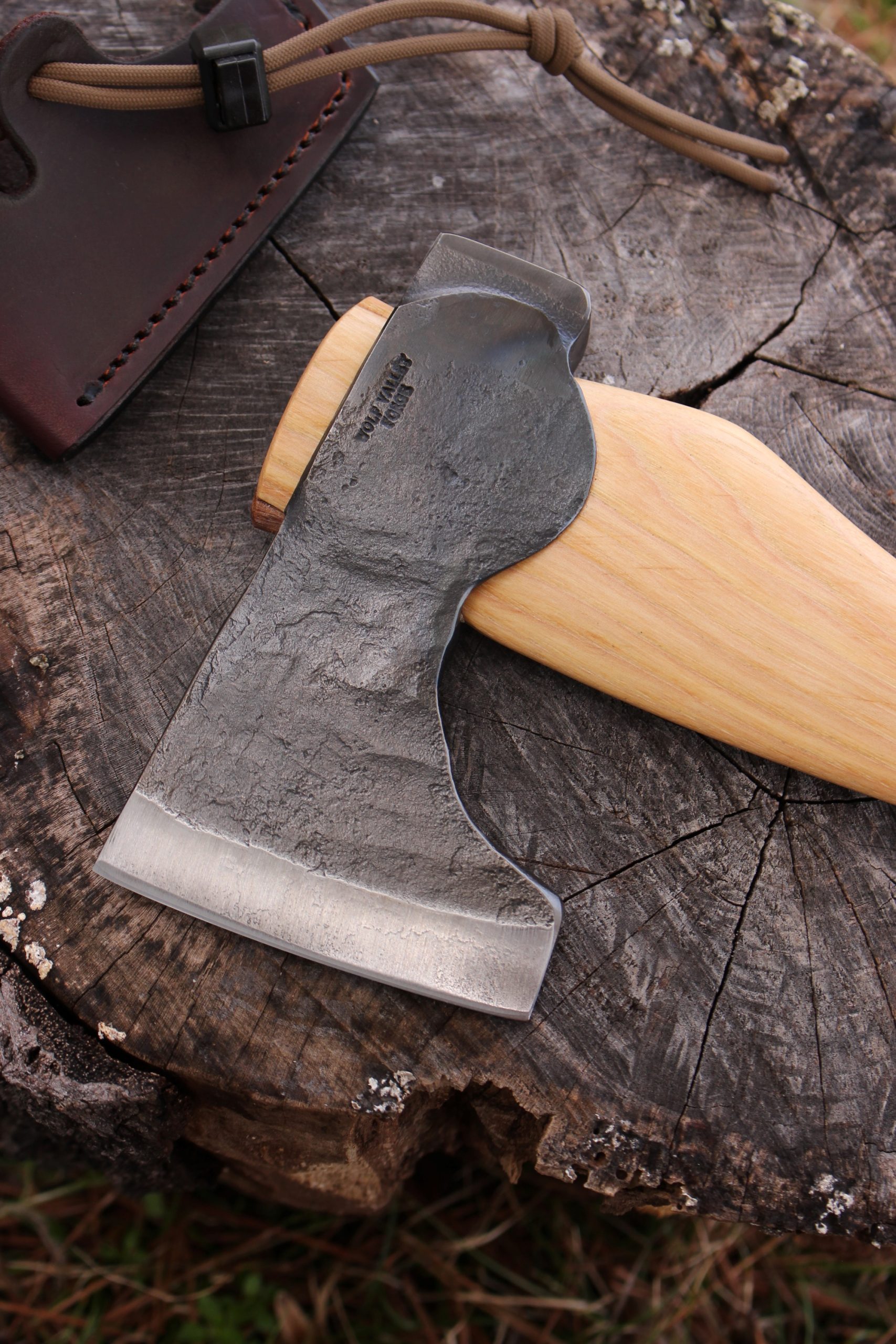 handmade, usa made, usa made axe, hatchet, chopping, wood chopping, outdoor, outdoorsman, survival, backwoodsman, hickory, axe made in america, axes made in the usa, ike bullington, wolf valley forge, valley forge, pack axe, back packing, camping, trail axe, hunting axe, trappers axe, camp axe, bush axe, belt axe, pack axe, leather shoulder rig, chopping axe, leather axe carrier, shoulder sling for axe, carpenter's axe, Wolf Valley Forge, Wolf Valley Forge axe release, Axe Wax, haversack, go back, man purse, man bag, canvas bag, reenactor, reenacting