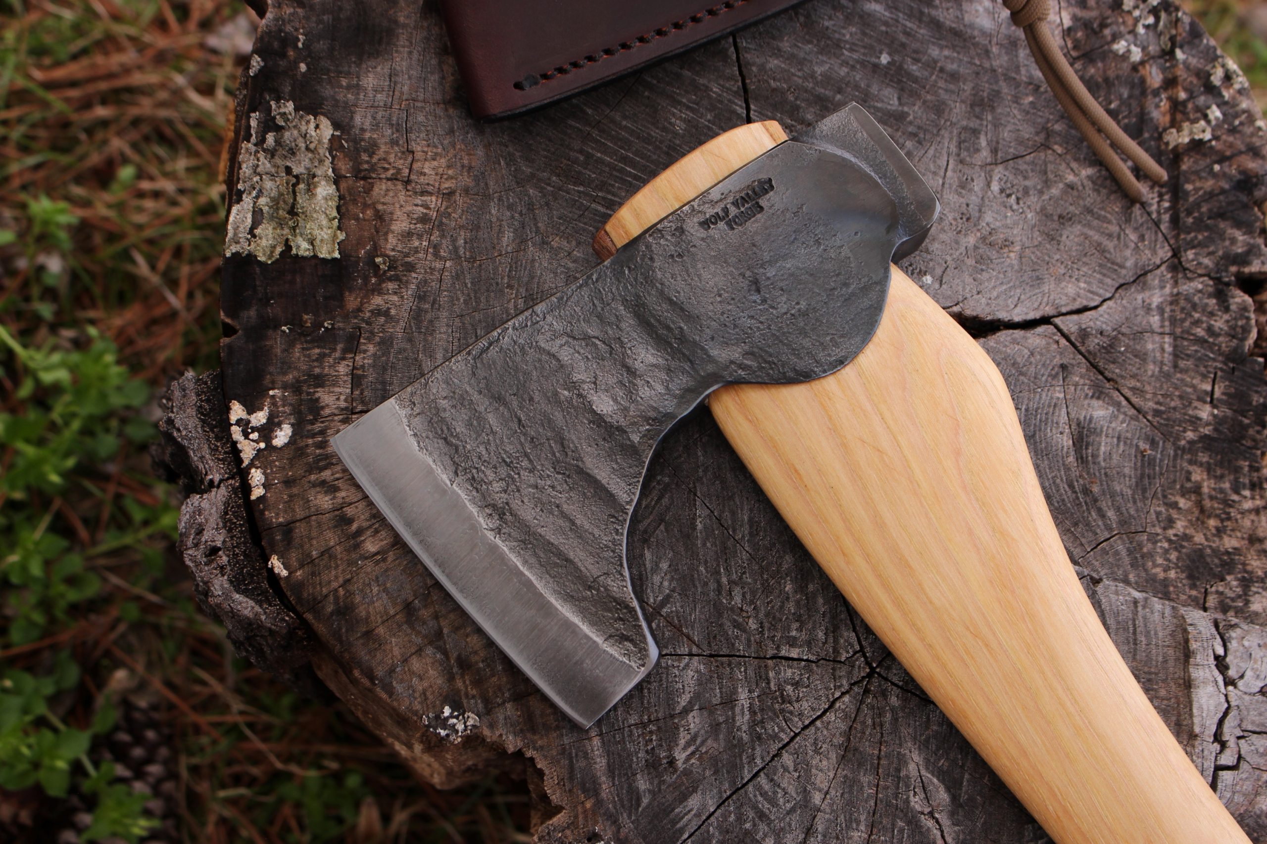 handmade, usa made, usa made axe, hatchet, chopping, wood chopping, outdoor, outdoorsman, survival, backwoodsman, hickory, axe made in america, axes made in the usa, ike bullington, wolf valley forge, valley forge, pack axe, back packing, camping, trail axe, hunting axe, trappers axe, camp axe, bush axe, belt axe, pack axe, leather shoulder rig, chopping axe, leather axe carrier, shoulder sling for axe, carpenter's axe, Wolf Valley Forge, Wolf Valley Forge axe release, Axe Wax, haversack, go back, man purse, man bag, canvas bag, reenactor, reenacting