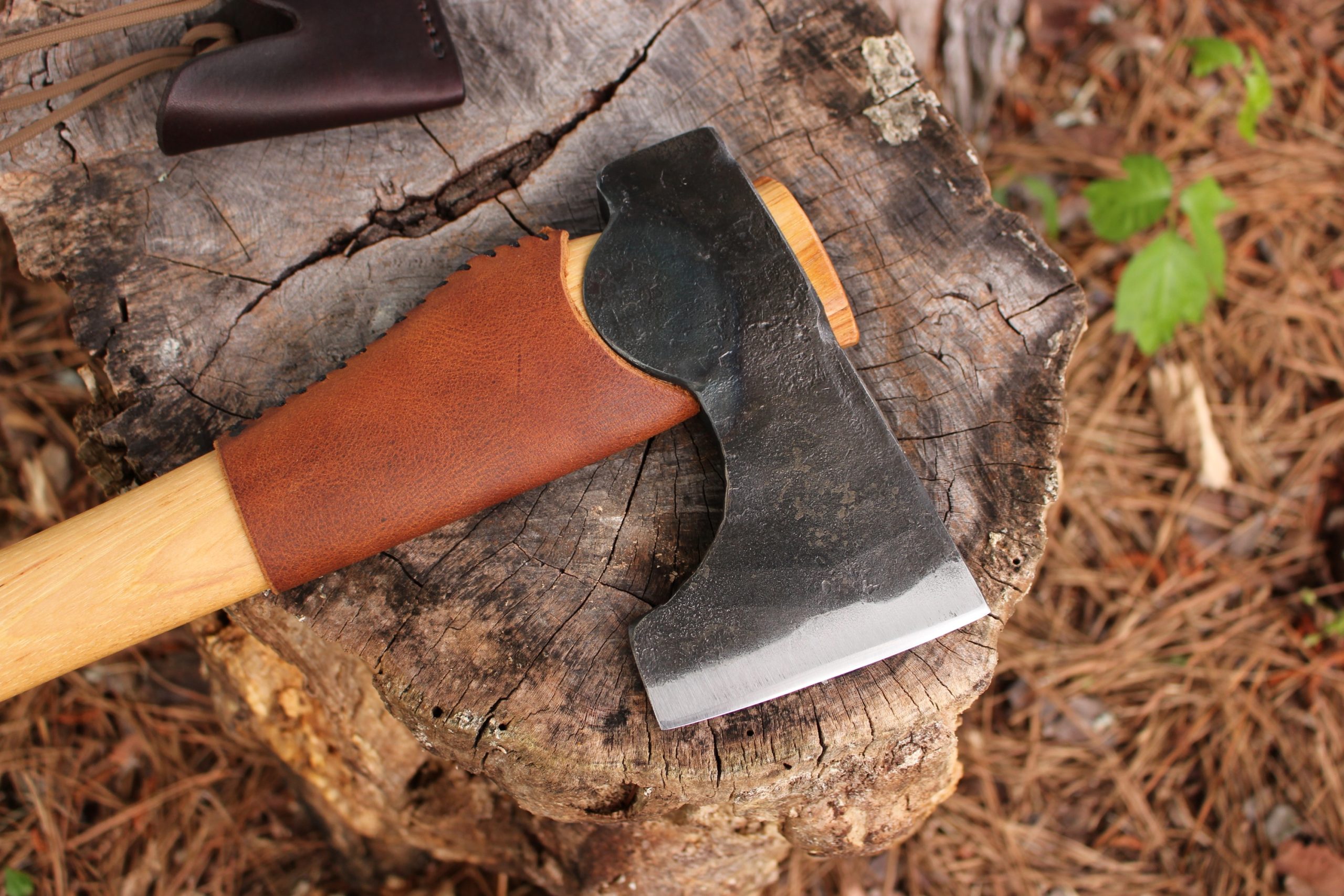 handmade, usa made, usa made axe, hatchet, chopping, wood chopping, outdoor, outdoorsman, survival, backwoodsman, hickory, axe made in america, axes made in the usa, ike bullington, wolf valley forge, valley forge, pack axe, back packing, camping, trail axe, hunting axe, trappers axe, camp axe, bush axe, belt axe, pack axe, leather shoulder rig, chopping axe, leather axe carrier, shoulder sling for axe, carpenter's axe, Wolf Valley Forge, Wolf Valley Forge axe release, Axe Wax, haversack, go back, man purse, man bag, canvas bag, reenactor, reenacting