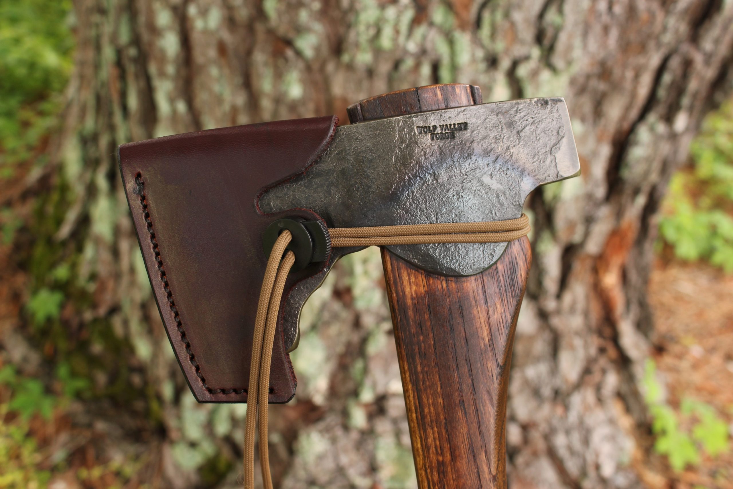 handmade, usa made, usa made axe, hatchet, chopping, wood chopping, outdoor, outdoorsman, survival, backwoodsman, hickory, axe made in america, axes made in the usa, ike bullington, wolf valley forge, valley forge, pack axe, back packing, camping, trail axe, hunting axe, trappers axe, camp axe, bush axe, belt axe, pack axe, leather shoulder rig, chopping axe, leather axe carrier, shoulder sling for axe, carpenter's axe, Wolf Valley Forge, Wolf Valley Forge axe release, Axe Wax, haversack, go back, man purse, man bag, canvas bag, reenactor, reenacting