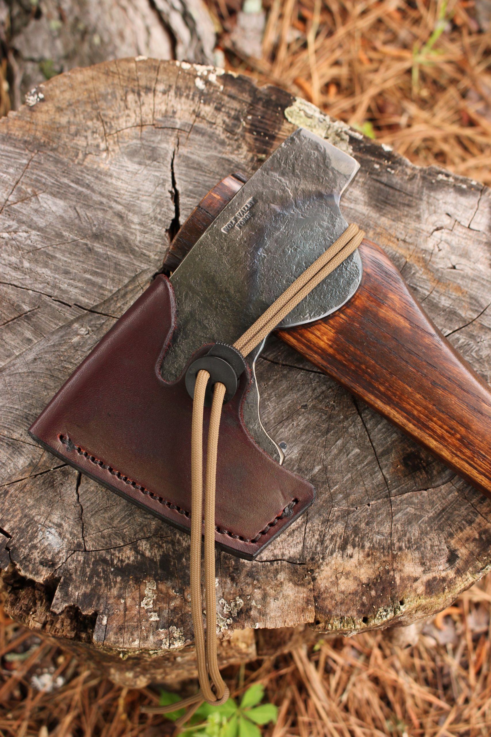 handmade, usa made, usa made axe, hatchet, chopping, wood chopping, outdoor, outdoorsman, survival, backwoodsman, hickory, axe made in america, axes made in the usa, ike bullington, wolf valley forge, valley forge, pack axe, back packing, camping, trail axe, hunting axe, trappers axe, camp axe, bush axe, belt axe, pack axe, leather shoulder rig, chopping axe, leather axe carrier, shoulder sling for axe, carpenter's axe, Wolf Valley Forge, Wolf Valley Forge axe release, Axe Wax, haversack, go back, man purse, man bag, canvas bag, reenactor, reenacting