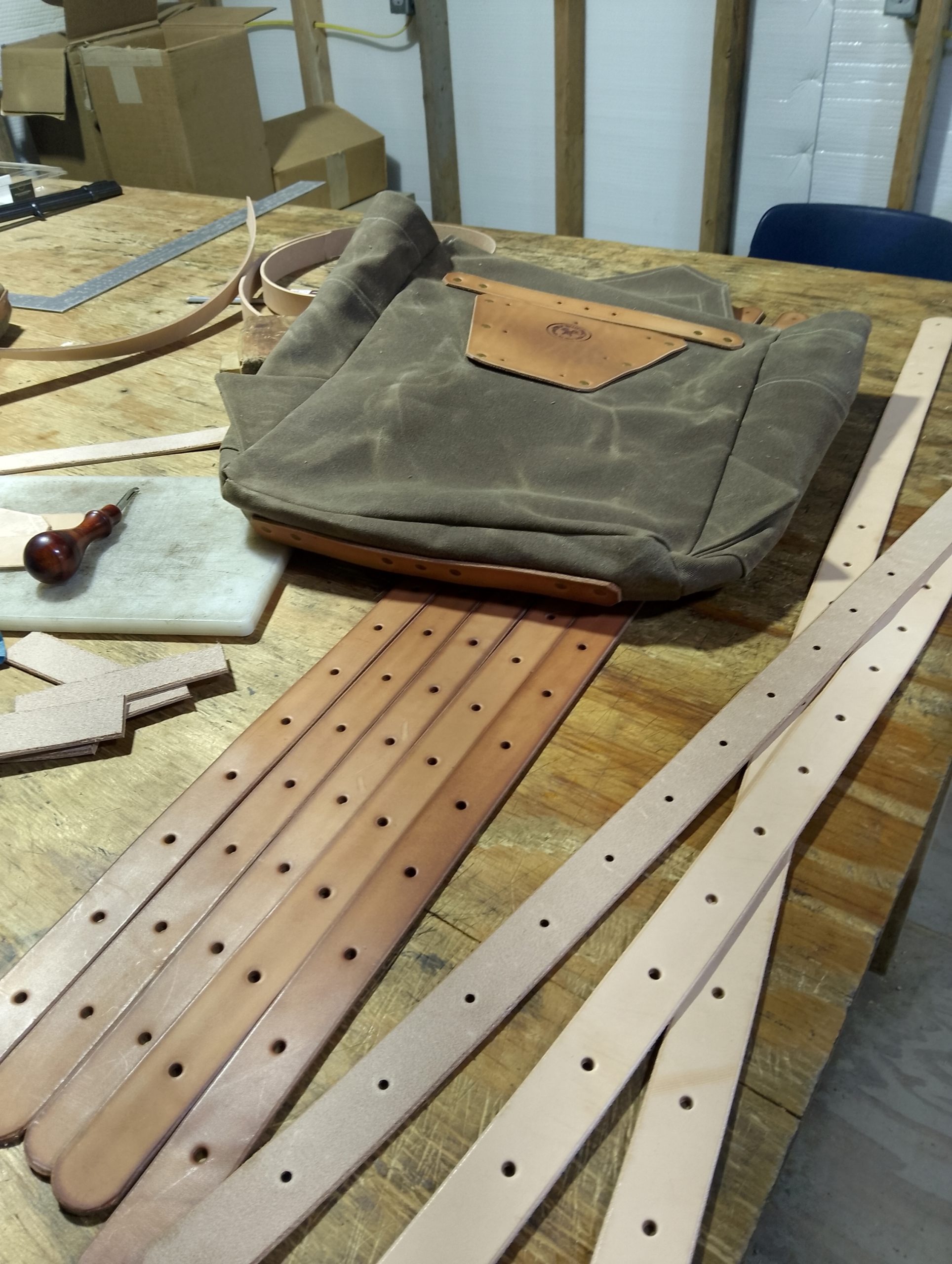 handmade, usa made, usa made axe, hatchet, chopping, wood chopping, outdoor, outdoorsman, survival, backwoodsman, hickory, axe made in america, axes made in the usa, ike bullington, wolf valley forge, valley forge, pack axe, back packing, camping, trail axe, hunting axe, trappers axe, camp axe, bush axe, belt axe, pack axe, leather shoulder rig, chopping axe, leather axe carrier, shoulder sling for axe, carpenter's axe, Wolf Valley Forge, Wolf Valley Forge axe release, Axe Wax, haversack, go back, man purse, man bag, canvas bag, reenactor, reenacting, Trekker Axe, canvas pack, backpacking, long hauler, sipsey wilderness area