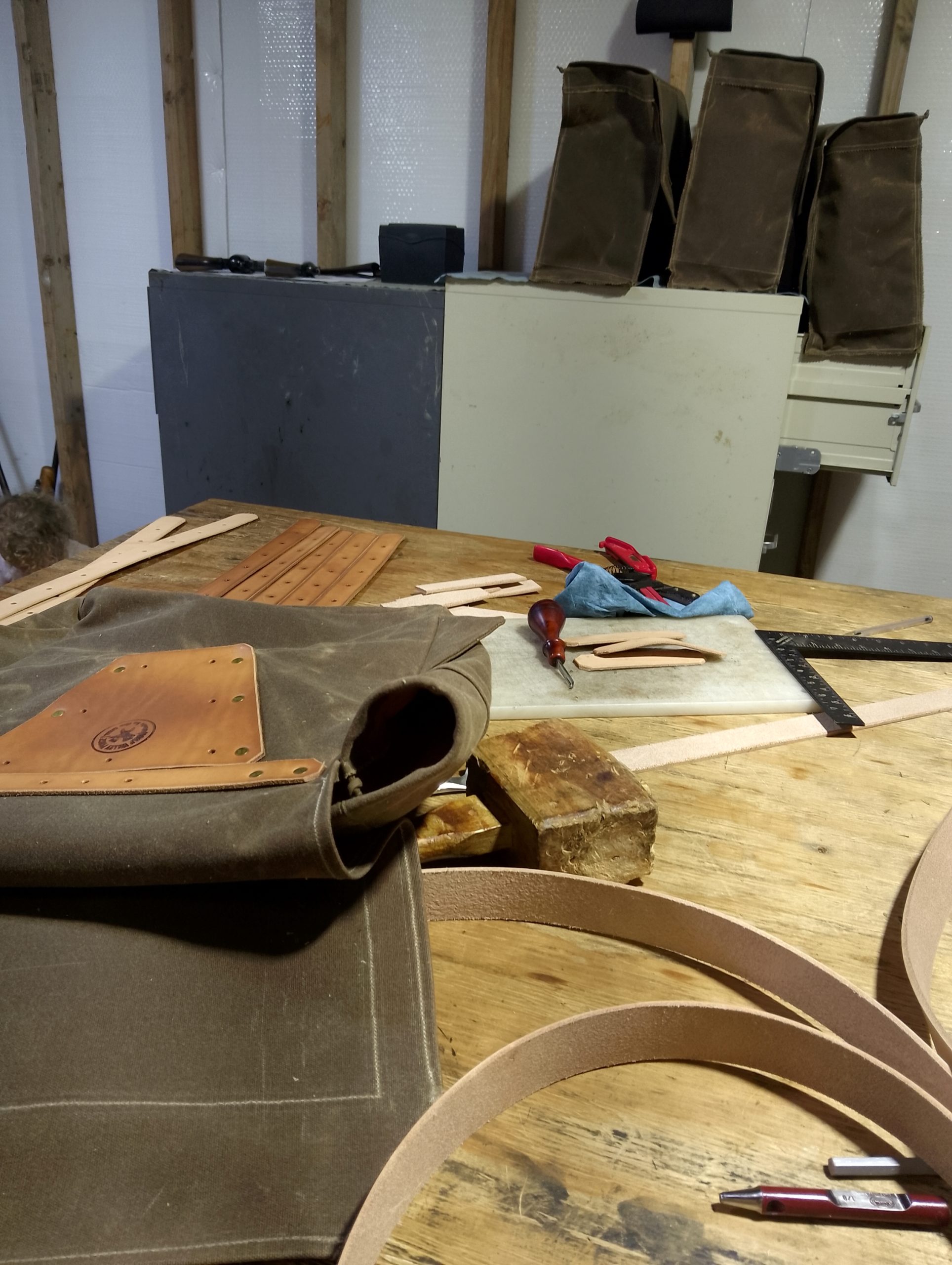 handmade, usa made, usa made axe, hatchet, chopping, wood chopping, outdoor, outdoorsman, survival, backwoodsman, hickory, axe made in america, axes made in the usa, ike bullington, wolf valley forge, valley forge, pack axe, back packing, camping, trail axe, hunting axe, trappers axe, camp axe, bush axe, belt axe, pack axe, leather shoulder rig, chopping axe, leather axe carrier, shoulder sling for axe, carpenter's axe, Wolf Valley Forge, Wolf Valley Forge axe release, Axe Wax, haversack, go back, man purse, man bag, canvas bag, reenactor, reenacting, Trekker Axe, canvas pack, backpacking, long hauler, sipsey wilderness area