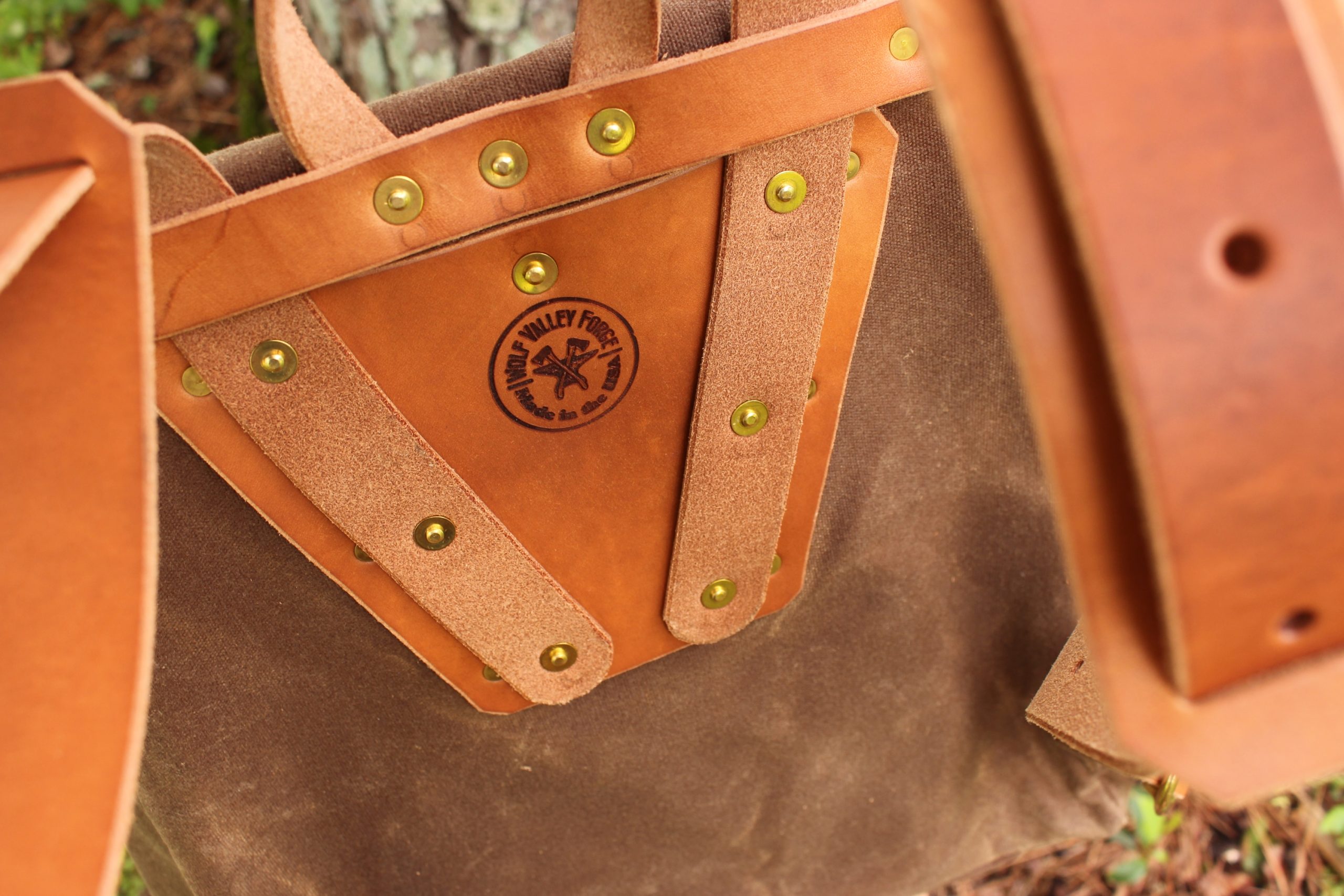 handmade, usa made, usa made axe, hatchet, chopping, wood chopping, outdoor, outdoorsman, survival, backwoodsman, hickory, axe made in america, axes made in the usa, ike bullington, wolf valley forge, valley forge, pack axe, back packing, camping, trail axe, hunting axe, trappers axe, camp axe, bush axe, belt axe, pack axe, leather shoulder rig, chopping axe, leather axe carrier, shoulder sling for axe, carpenter's axe, Wolf Valley Forge, Wolf Valley Forge axe release, Axe Wax, haversack, go back, man purse, man bag, canvas bag, reenactor, reenacting, Trekker Axe, canvas pack, backpacking, long hauler, sipsey wilderness area