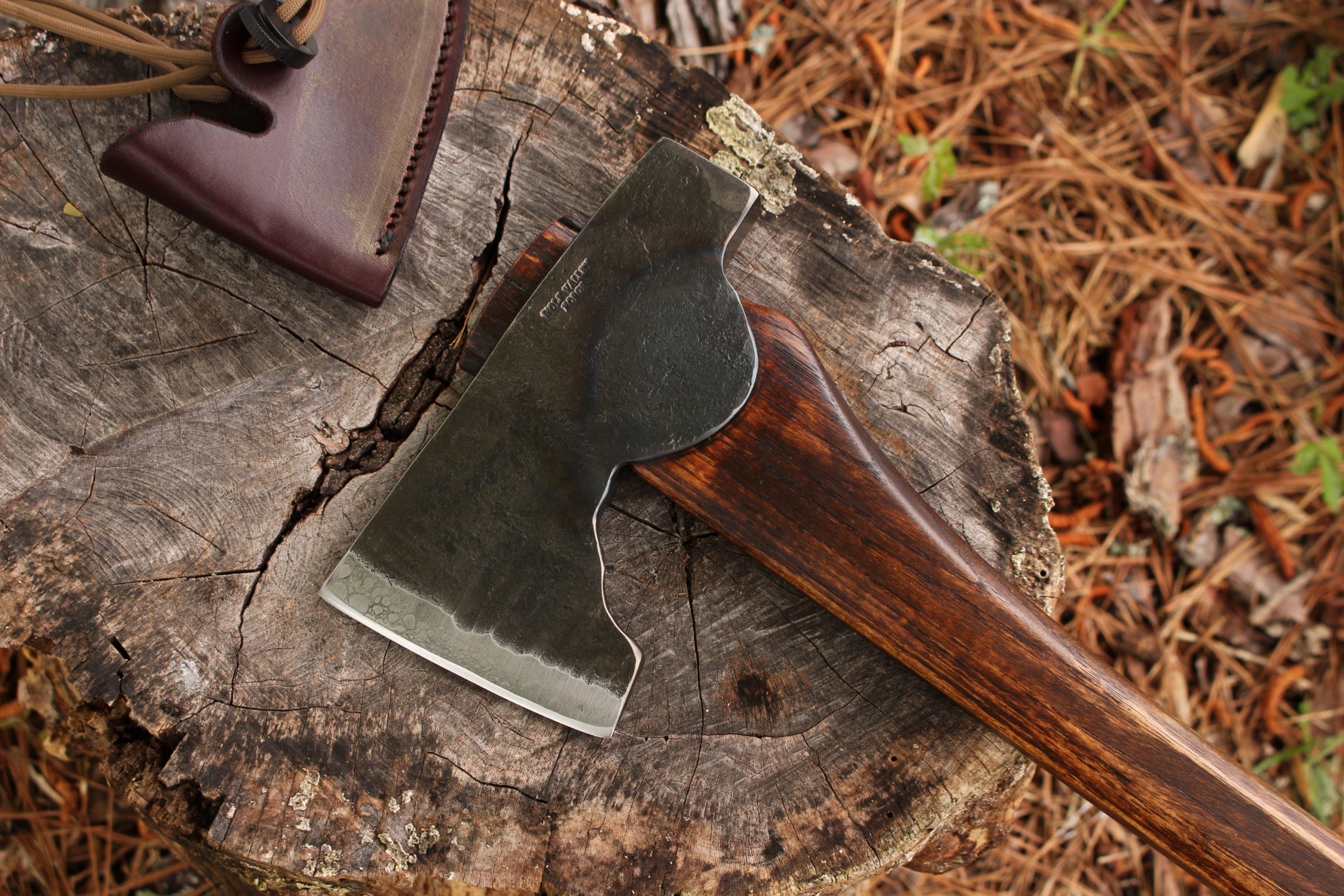 handmade, usa made, usa made axe, hatchet, chopping, wood chopping, outdoor, outdoorsman, survival, backwoodsman, hickory, axe made in america, axes made in the usa, ike bullington, wolf valley forge, valley forge, pack axe, back packing, camping, trail axe, hunting axe, trappers axe, camp axe, bush axe, belt axe, pack axe, leather shoulder rig, chopping axe, leather axe carrier, shoulder sling for axe, carpenter's axe, Wolf Valley Forge, Wolf Valley Forge axe release, Axe Wax, haversack, go back, man purse, man bag, canvas bag, reenactor, reenacting