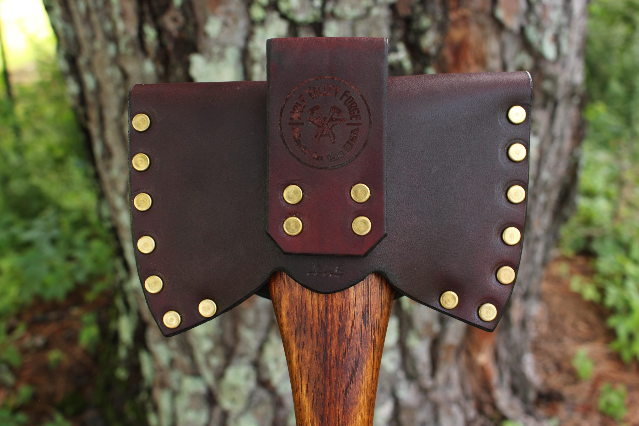 handmade, usa made, usa made axe, hatchet, chopping, wood chopping, outdoor, outdoorsman, survival, backwoodsman, hickory, axe made in america, axes made in the usa, ike bullington, wolf valley forge, valley forge, pack axe, back packing, camping, trail axe, hunting axe, trappers axe, camp axe, bush axe, belt axe, pack axe, leather shoulder rig, chopping axe, leather axe carrier, shoulder sling for axe, carpenter's axe, Wolf Valley Forge, Wolf Valley Forge axe release, Axe Wax, haversack, go back, man purse, man bag, canvas bag, reenactor, reenacting