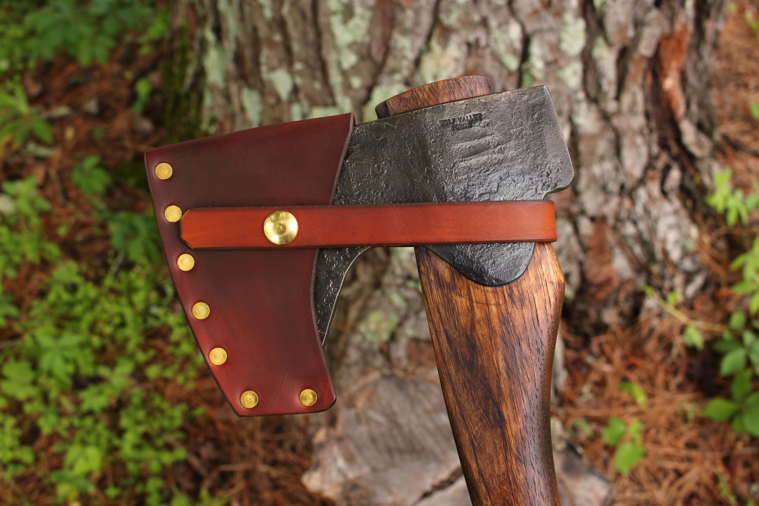 handmade, usa made, usa made axe, hatchet, chopping, wood chopping, outdoor, outdoorsman, survival, backwoodsman, hickory, axe made in america, axes made in the usa, ike bullington, wolf valley forge, valley forge, pack axe, back packing, camping, trail axe, hunting axe, trappers axe, camp axe, bush axe, belt axe, pack axe, leather shoulder rig, chopping axe, leather axe carrier, shoulder sling for axe, carpenter's axe, Wolf Valley Forge, Wolf Valley Forge axe release, Axe Wax, haversack, go bag, man purse, man bag, canvas bag, reenactor, reenacting, Trekker Axe, Axe Life