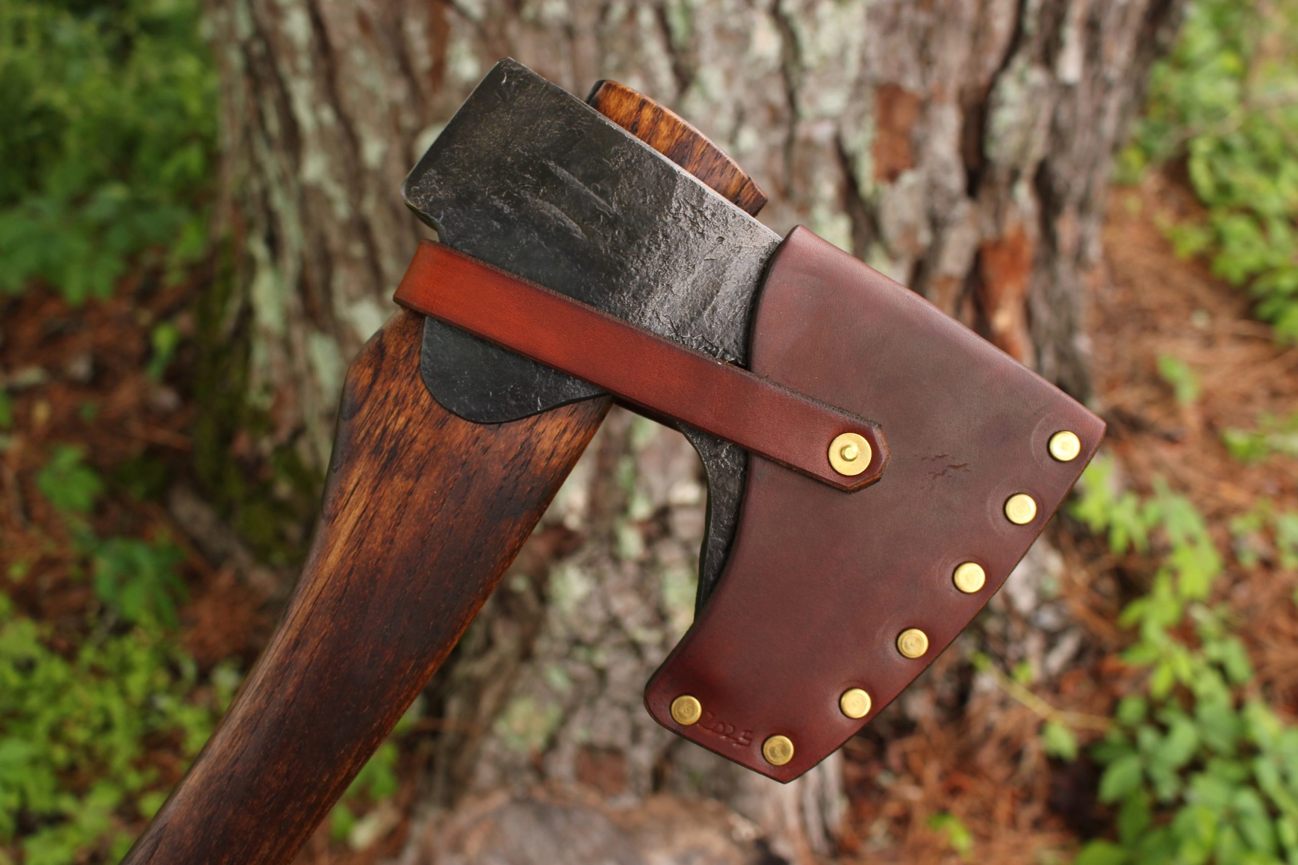 handmade, usa made, usa made axe, hatchet, chopping, wood chopping, outdoor, outdoorsman, survival, backwoodsman, hickory, axe made in america, axes made in the usa, ike bullington, wolf valley forge, valley forge, pack axe, back packing, camping, trail axe, hunting axe, trappers axe, camp axe, bush axe, belt axe, pack axe, leather shoulder rig, chopping axe, leather axe carrier, shoulder sling for axe, carpenter's axe, Wolf Valley Forge, Wolf Valley Forge axe release, Axe Wax, haversack, go bag, man purse, man bag, canvas bag, reenactor, reenacting, Trekker Axe, Axe Life