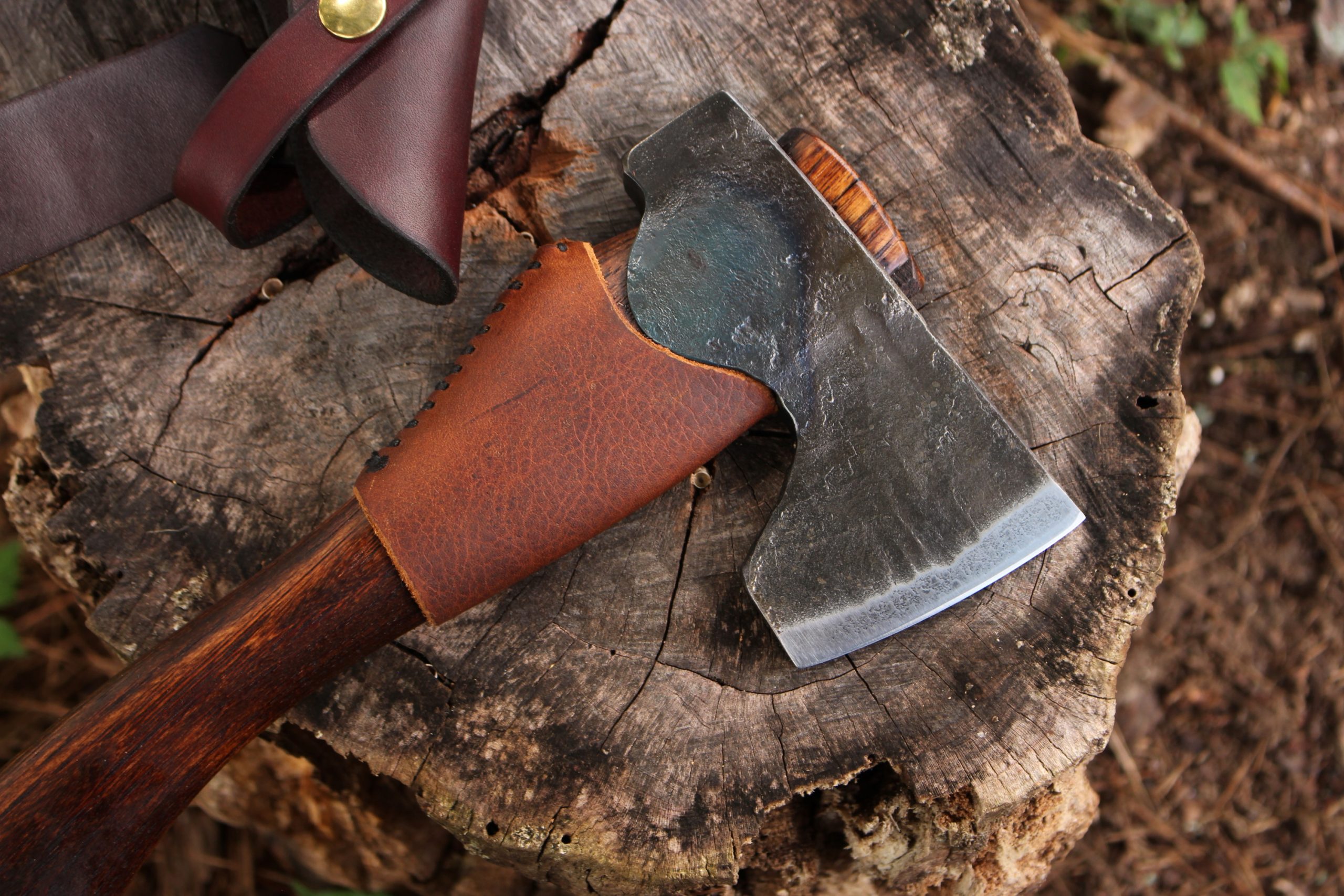 handmade, usa made, usa made axe, hatchet, chopping, wood chopping, outdoor, outdoorsman, survival, backwoodsman, hickory, axe made in america, axes made in the usa, ike bullington, wolf valley forge, valley forge, pack axe, back packing, camping, trail axe, hunting axe, trappers axe, camp axe, bush axe, belt axe, pack axe, leather shoulder rig, chopping axe, leather axe carrier, shoulder sling for axe, carpenter's axe, Wolf Valley Forge, Wolf Valley Forge axe release, Axe Wax, haversack, go bag, man purse, man bag, canvas bag, reenactor, reenacting, Trekker Axe, Axe Life