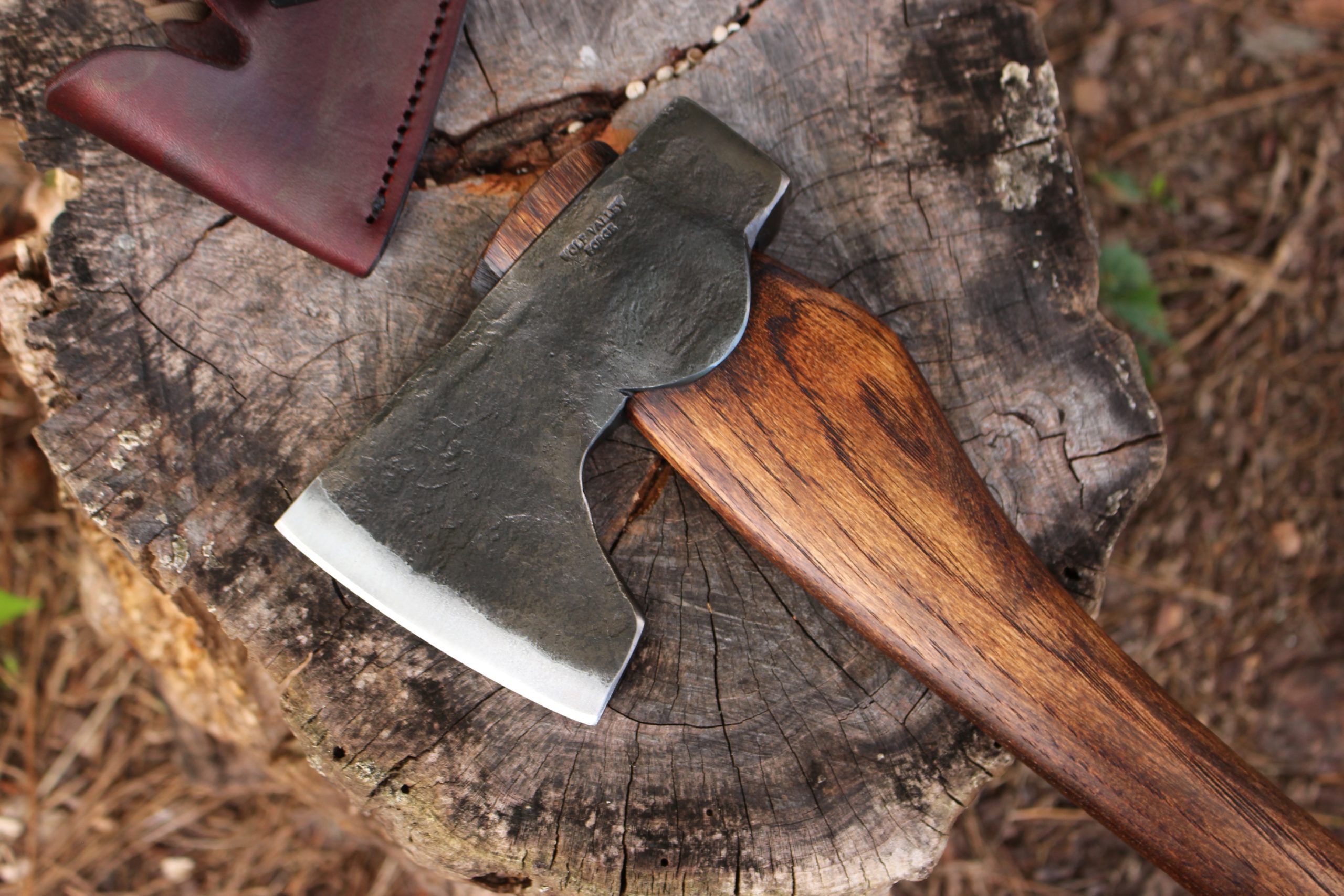 handmade, usa made, usa made axe, hatchet, chopping, wood chopping, outdoor, outdoorsman, survival, backwoodsman, hickory, axe made in america, axes made in the usa, ike bullington, wolf valley forge, valley forge, pack axe, back packing, camping, trail axe, hunting axe, trappers axe, camp axe, bush axe, belt axe, pack axe, leather shoulder rig, chopping axe, leather axe carrier, shoulder sling for axe, carpenter's axe, Wolf Valley Forge, Wolf Valley Forge axe release, Axe Wax, haversack, go bag, man purse, man bag, canvas bag, reenactor, reenacting, Trekker Axe, Axe Life