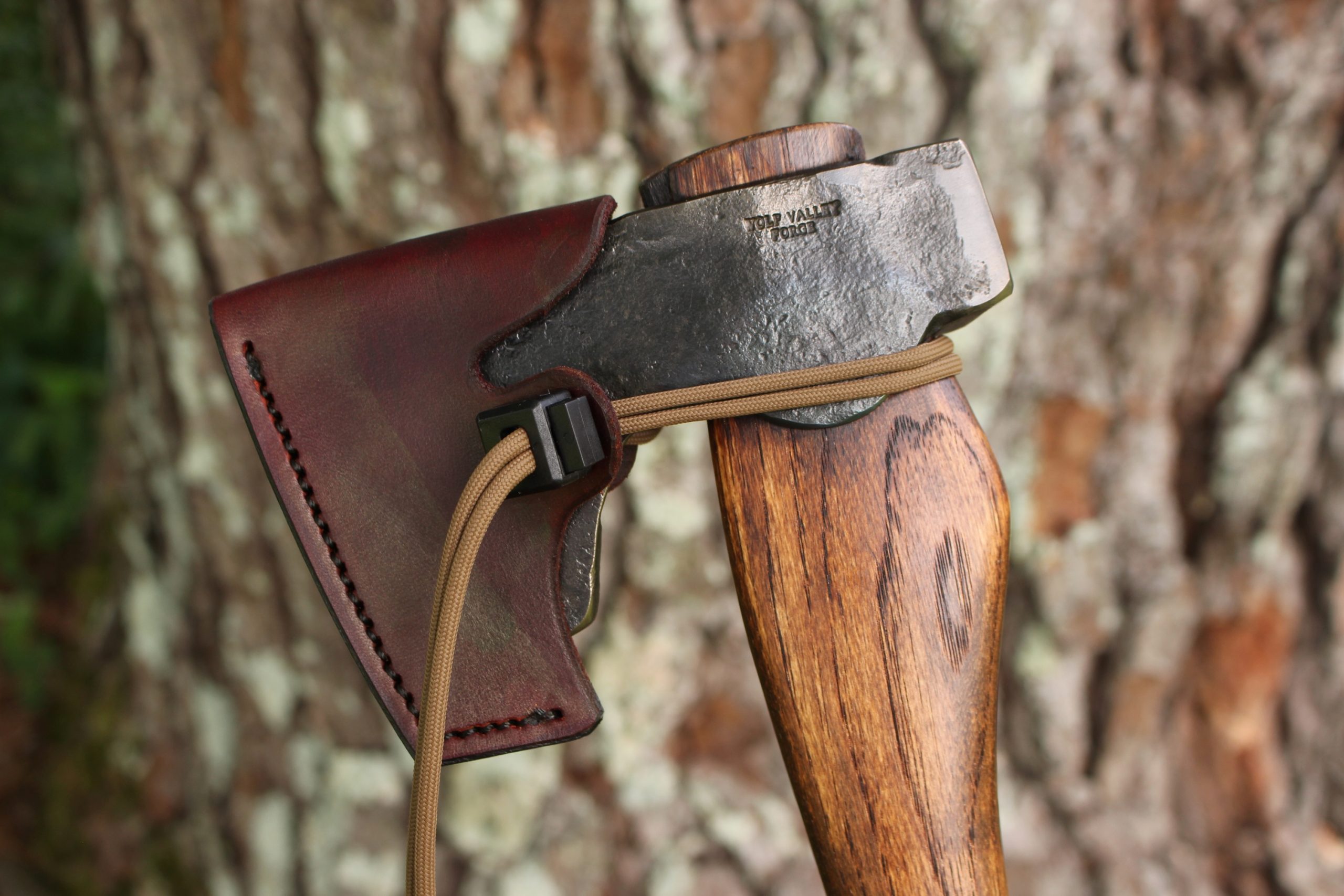 handmade, usa made, usa made axe, hatchet, chopping, wood chopping, outdoor, outdoorsman, survival, backwoodsman, hickory, axe made in america, axes made in the usa, ike bullington, wolf valley forge, valley forge, pack axe, back packing, camping, trail axe, hunting axe, trappers axe, camp axe, bush axe, belt axe, pack axe, leather shoulder rig, chopping axe, leather axe carrier, shoulder sling for axe, carpenter's axe, Wolf Valley Forge, Wolf Valley Forge axe release, Axe Wax, haversack, go bag, man purse, man bag, canvas bag, reenactor, reenacting, Trekker Axe, Axe Life