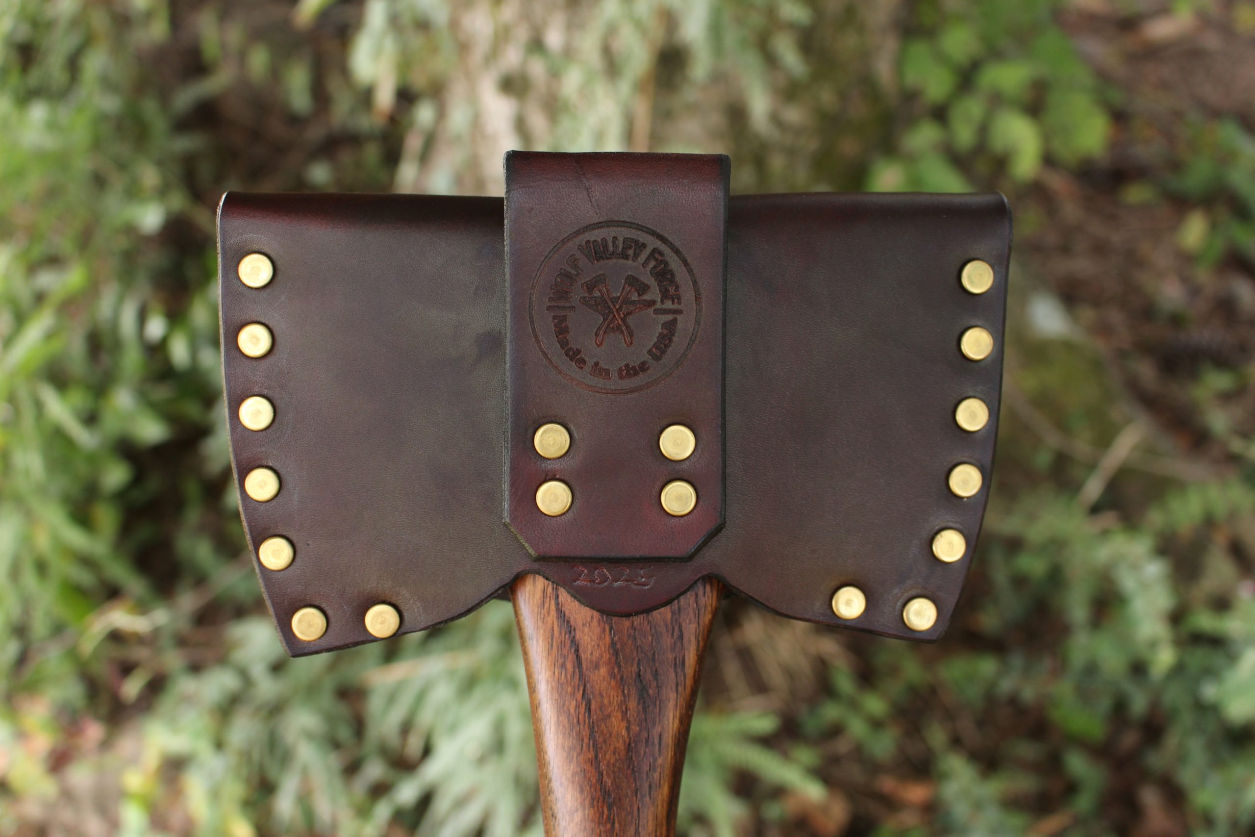 handmade, usa made, usa made axe, hatchet, chopping, wood chopping, outdoor, outdoorsman, survival, backwoodsman, hickory, axe made in america, axes made in the usa, ike bullington, wolf valley forge, valley forge, pack axe, back packing, camping, trail axe, hunting axe, trappers axe, camp axe, bush axe, belt axe, pack axe, leather shoulder rig, chopping axe, leather axe carrier, shoulder sling for axe, carpenter's axe, Wolf Valley Forge, Wolf Valley Forge axe release, Axe Wax, haversack, go bag, man purse, man bag, canvas bag, reenactor, reenacting, Trekker Axe, Axe Life