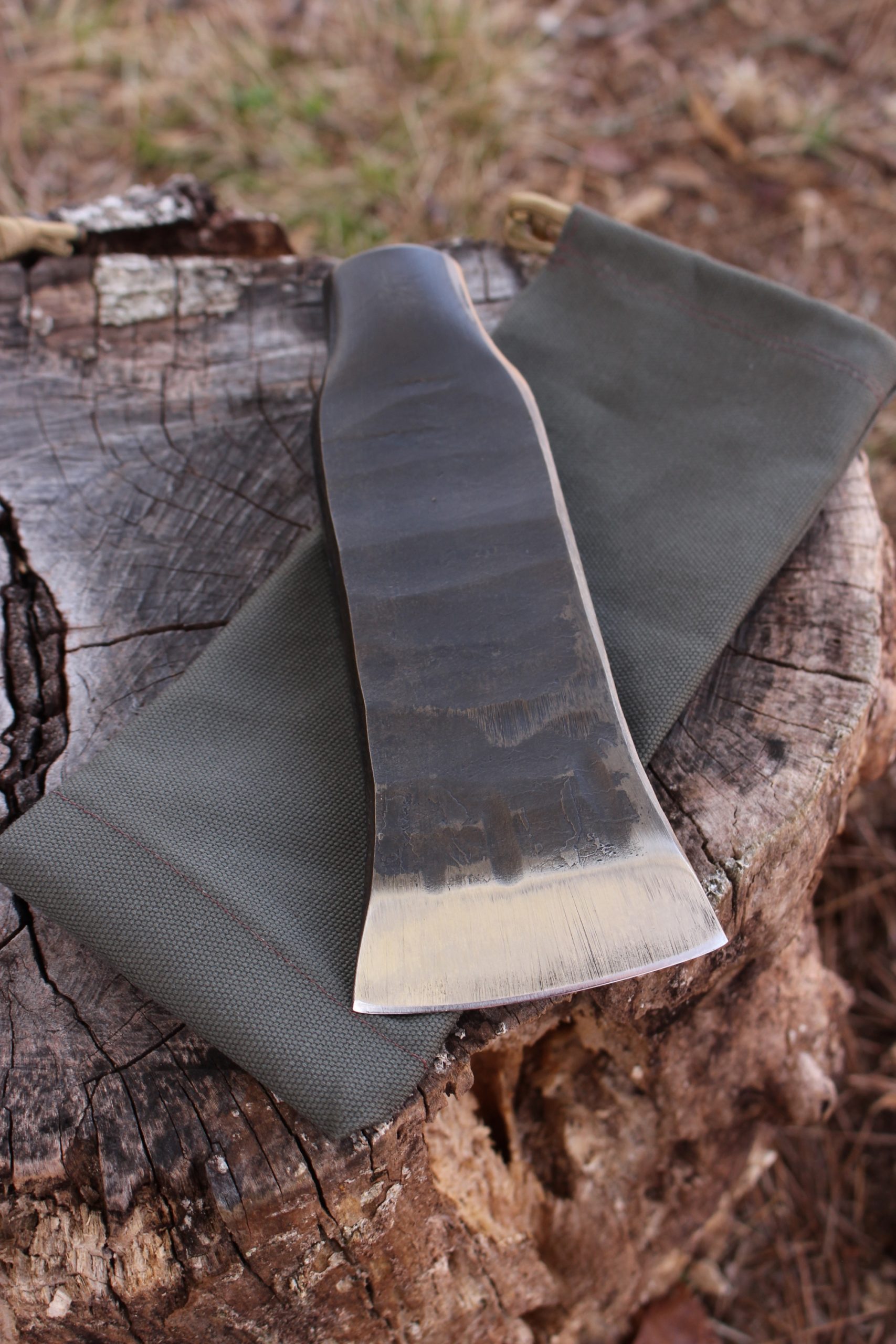 handmade, usa made, usa made axe, hatchet, chopping, wood chopping, outdoor, outdoorsman, survival, backwoodsman, hickory, axe made in america, axes made in the usa, ike bullington, wolf valley forge, valley forge, pack axe, back packing, camping, trail axe, hunting axe, trappers axe, camp axe, bush axe, belt axe, pack axe, leather shoulder rig, chopping axe, leather axe carrier, shoulder sling for axe, carpenter's axe, Wolf Valley Forge, Wolf Valley Forge axe release, Axe Wax, haversack, go bag, man purse, man bag, canvas bag, reenactor, reenacting, Trekker Axe, Axe Life