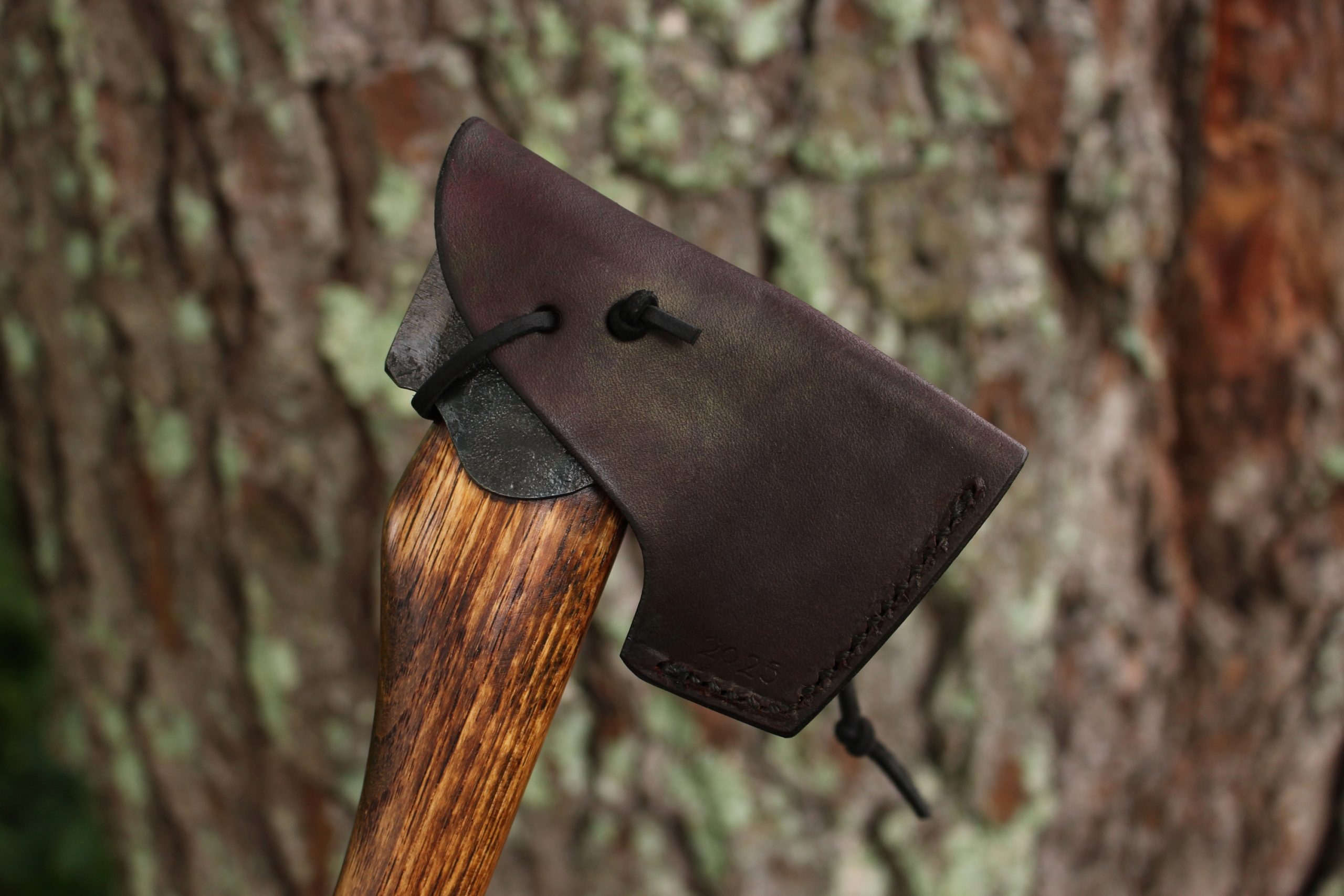 handmade, usa made, usa made axe, hatchet, chopping, wood chopping, outdoor, outdoorsman, survival, backwoodsman, hickory, axe made in america, axes made in the usa, ike bullington, wolf valley forge, valley forge, pack axe, back packing, camping, trail axe, hunting axe, trappers axe, camp axe, bush axe, belt axe, pack axe, leather shoulder rig, chopping axe, leather axe carrier, shoulder sling for axe, carpenter's axe, Wolf Valley Forge, Wolf Valley Forge axe release, Axe Wax, haversack, go back, man purse, man bag, canvas bag, reenactor, reenacting