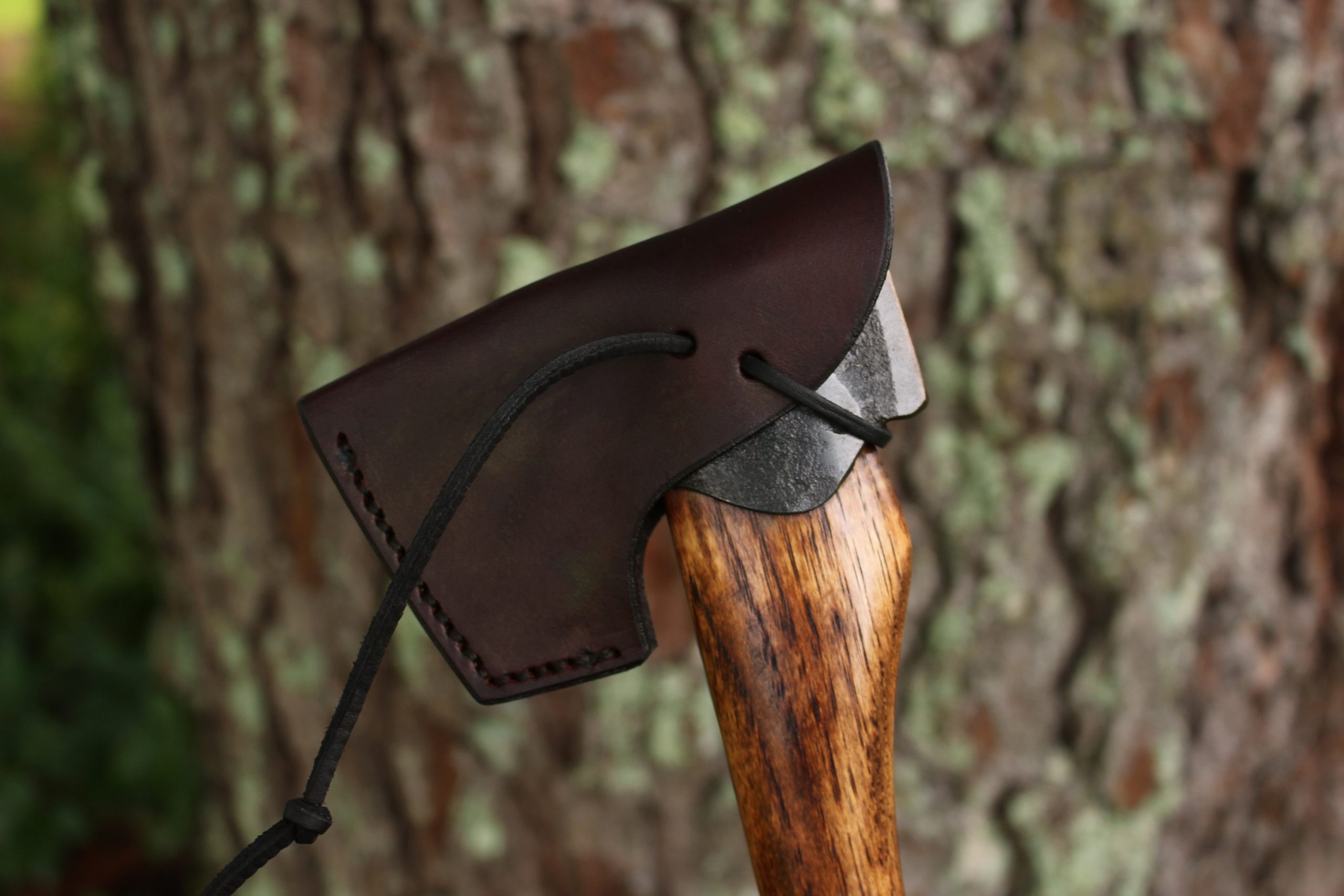 handmade, usa made, usa made axe, hatchet, chopping, wood chopping, outdoor, outdoorsman, survival, backwoodsman, hickory, axe made in america, axes made in the usa, ike bullington, wolf valley forge, valley forge, pack axe, back packing, camping, trail axe, hunting axe, trappers axe, camp axe, bush axe, belt axe, pack axe, leather shoulder rig, chopping axe, leather axe carrier, shoulder sling for axe, carpenter's axe, Wolf Valley Forge, Wolf Valley Forge axe release, Axe Wax, haversack, go back, man purse, man bag, canvas bag, reenactor, reenacting