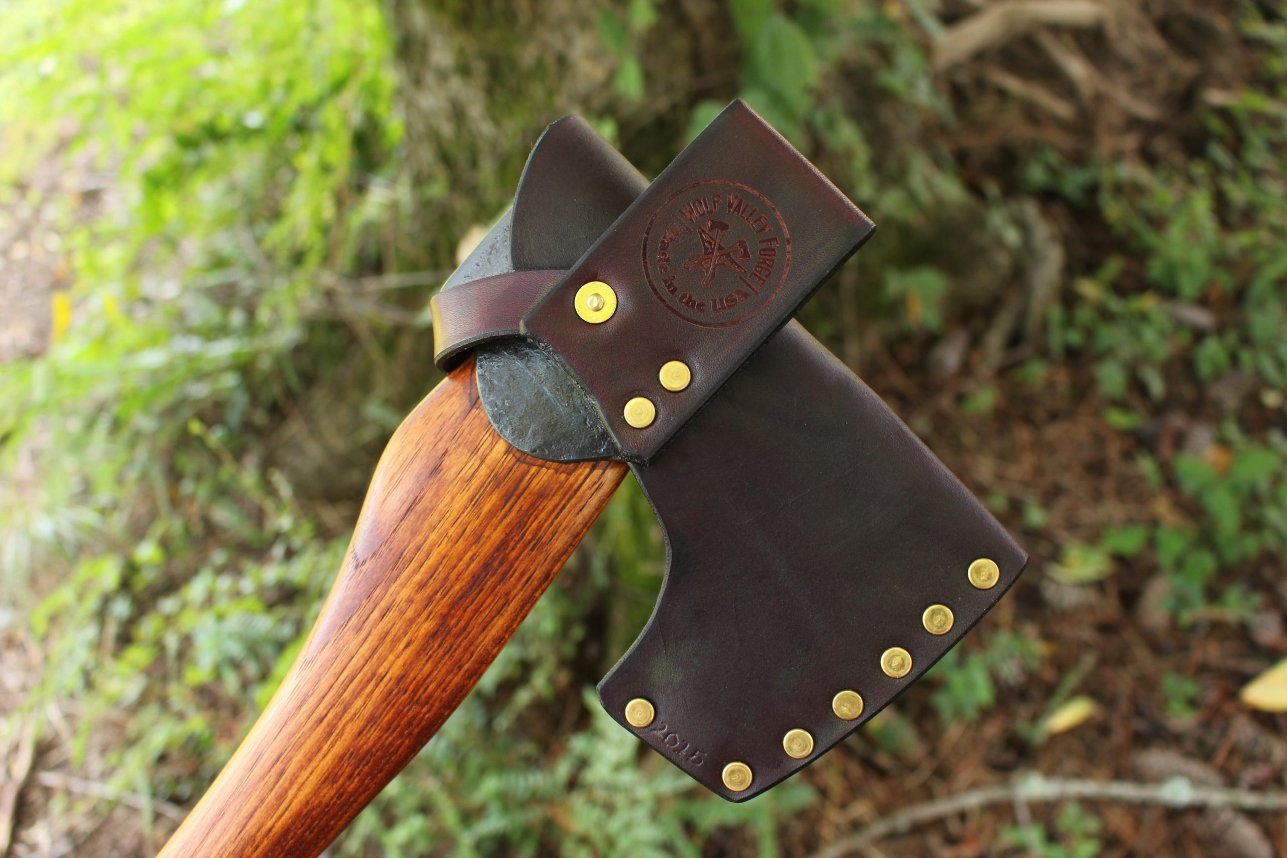handmade, usa made, usa made axe, hatchet, chopping, wood chopping, outdoor, outdoorsman, survival, backwoodsman, hickory, axe made in america, axes made in the usa, ike bullington, wolf valley forge, valley forge, pack axe, back packing, camping, trail axe, hunting axe, trappers axe, camp axe, bush axe, belt axe, pack axe, leather shoulder rig, chopping axe, leather axe carrier, shoulder sling for axe, carpenter's axe, Wolf Valley Forge, Wolf Valley Forge axe release, Axe Wax, haversack, go back, man purse, man bag, canvas bag, reenactor, reenacting
