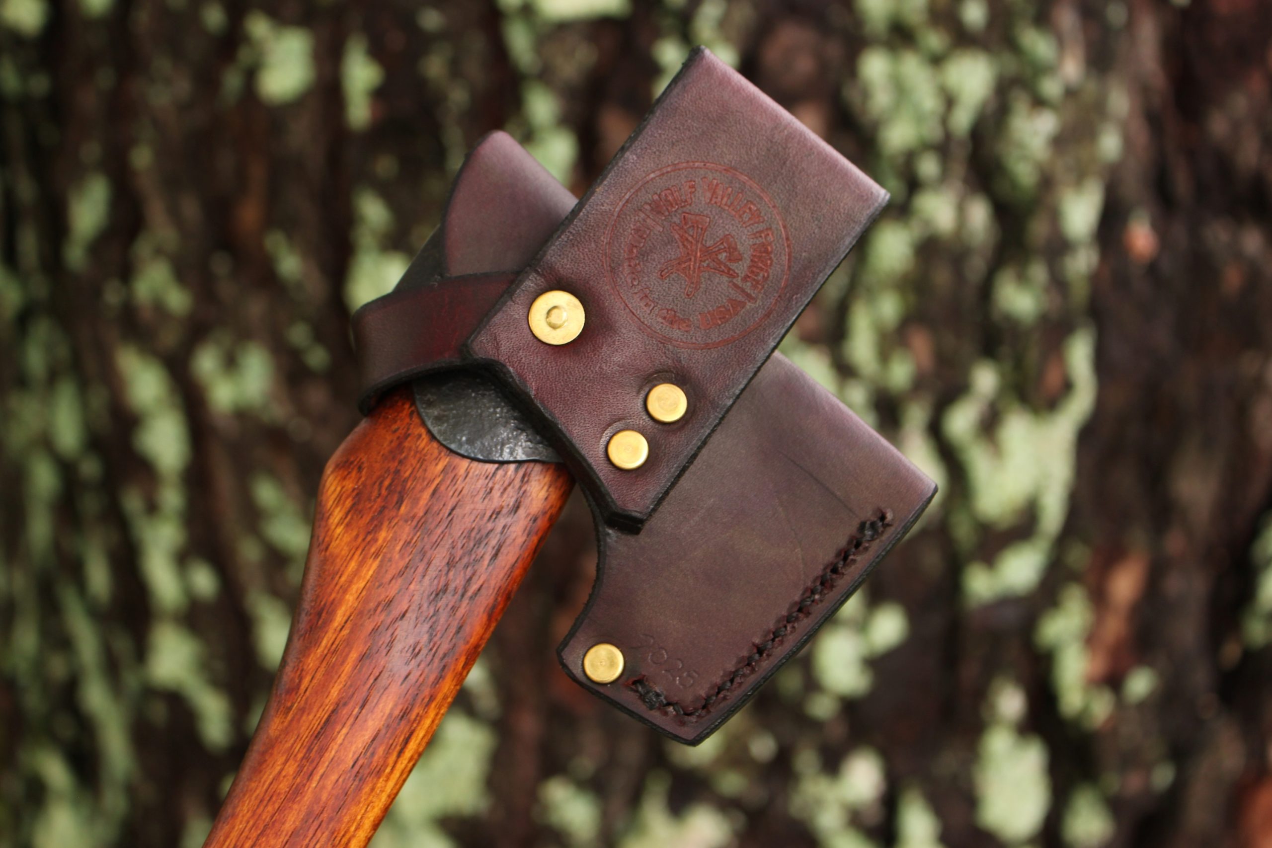 handmade, usa made, usa made axe, hatchet, chopping, wood chopping, outdoor, outdoorsman, survival, backwoodsman, hickory, axe made in america, axes made in the usa, ike bullington, wolf valley forge, valley forge, pack axe, back packing, camping, trail axe, hunting axe, trappers axe, camp axe, bush axe, belt axe, pack axe, leather shoulder rig, chopping axe, leather axe carrier, shoulder sling for axe, carpenter's axe, Wolf Valley Forge, Wolf Valley Forge axe release, Axe Wax, haversack, go back, man purse, man bag, canvas bag, reenactor, reenacting