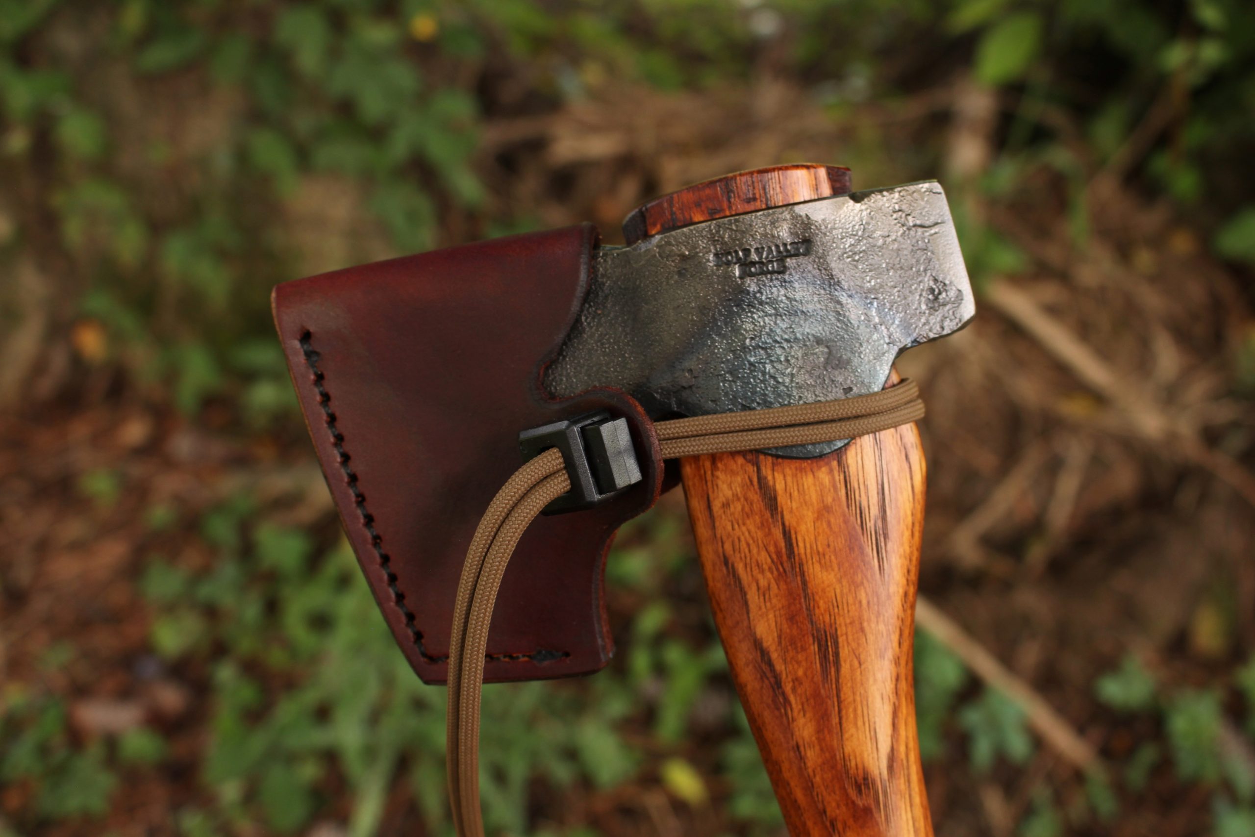 handmade, usa made, usa made axe, hatchet, chopping, wood chopping, outdoor, outdoorsman, survival, backwoodsman, hickory, axe made in america, axes made in the usa, ike bullington, wolf valley forge, valley forge, pack axe, back packing, camping, trail axe, hunting axe, trappers axe, camp axe, bush axe, belt axe, pack axe, leather shoulder rig, chopping axe, leather axe carrier, shoulder sling for axe, carpenter's axe, Wolf Valley Forge, Wolf Valley Forge axe release, Axe Wax, haversack, go back, man purse, man bag, canvas bag, reenactor, reenacting